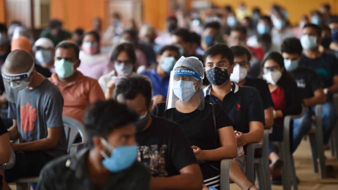 People aged 18 and over waiting to be inoculated against Covid-19 at a vaccination centre at Radha Soami Satsang grounds being run by BLK-Max hospital on May 4, 2021 in New Delhi, India.