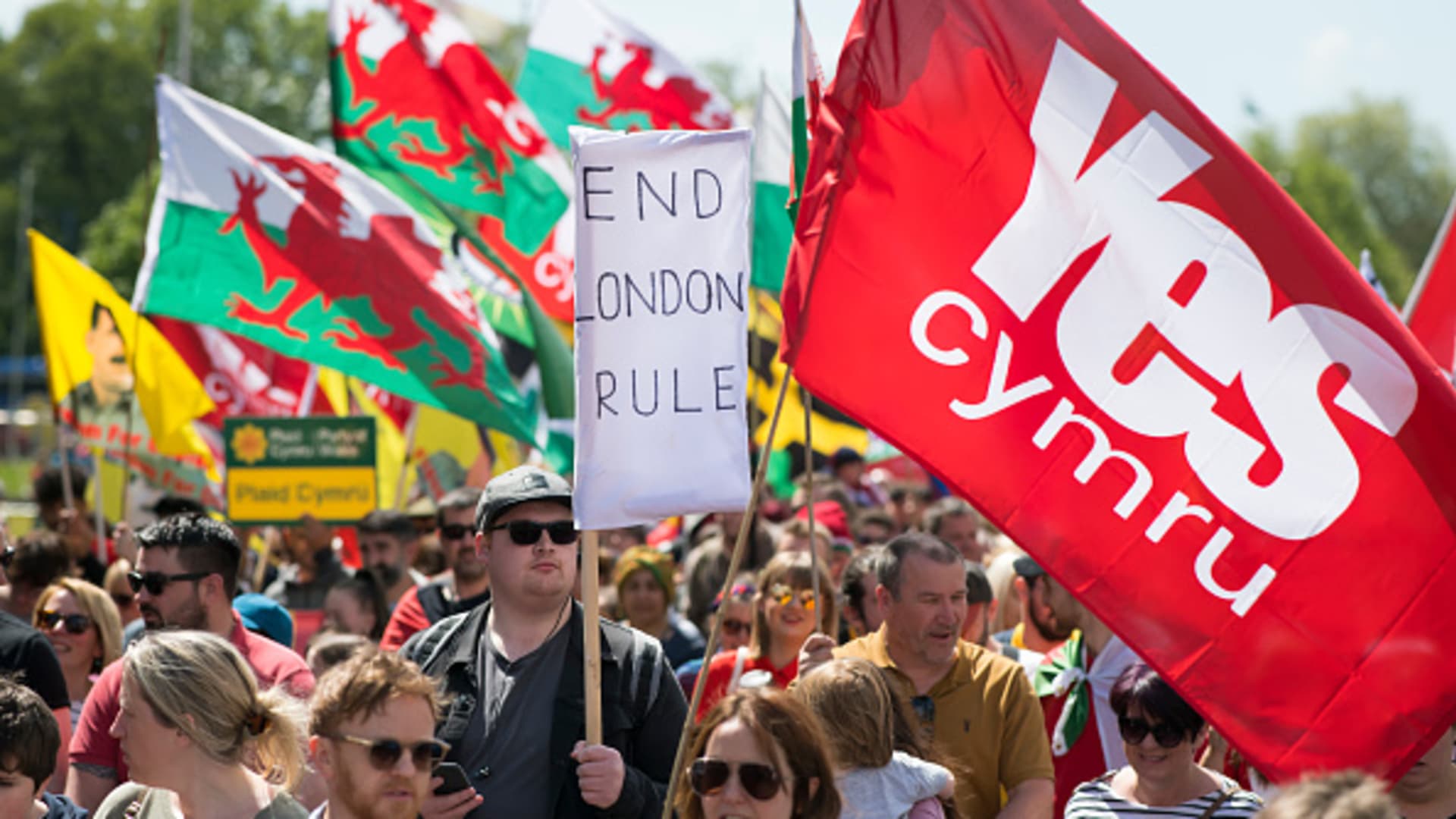 A man holds a sign as thousands take part in the first ever march for Welsh independence from City Hall to the Hayes on May 11, 2019 in Cardiff, Wales.