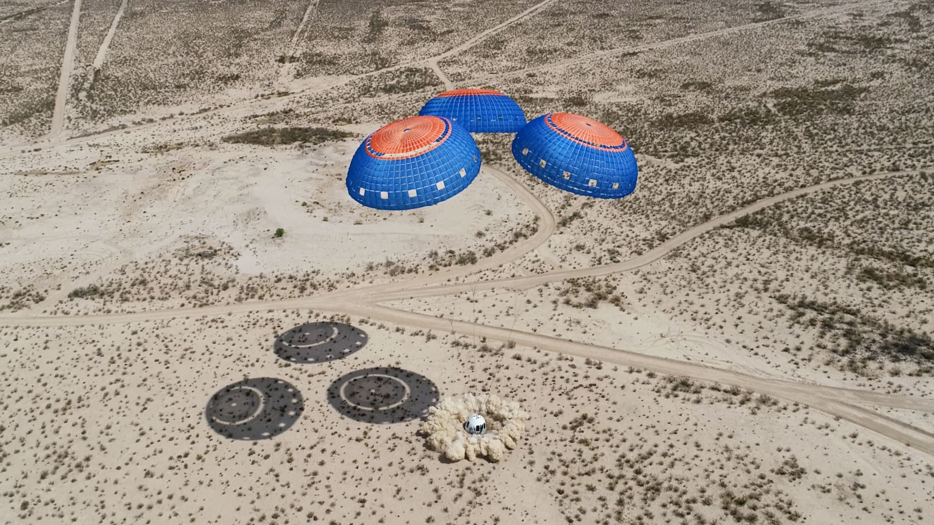 The New Shepard crew capsule lands in the West Texas desert after the NS-15 mission on April 14, 2021.