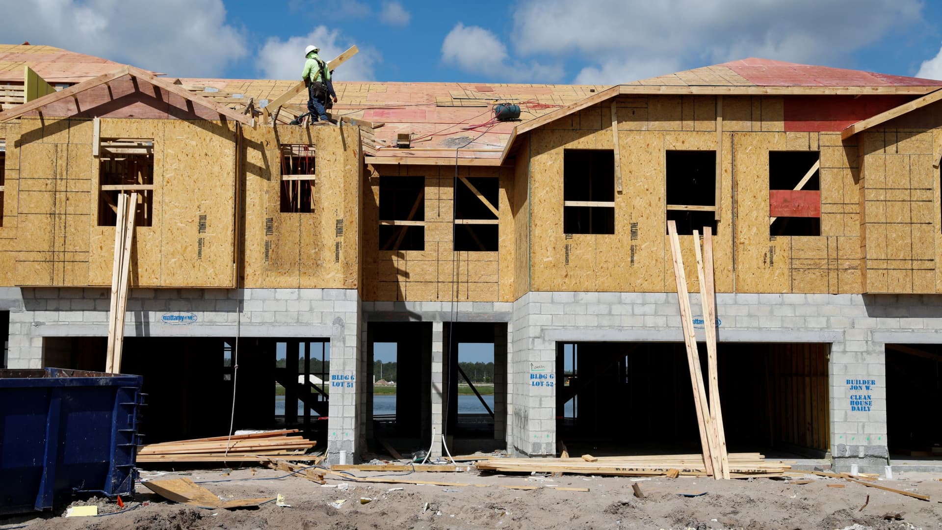 New townhomes are under construction while building material supplies are in high demand in Tampa, Florida, May 5, 2021.