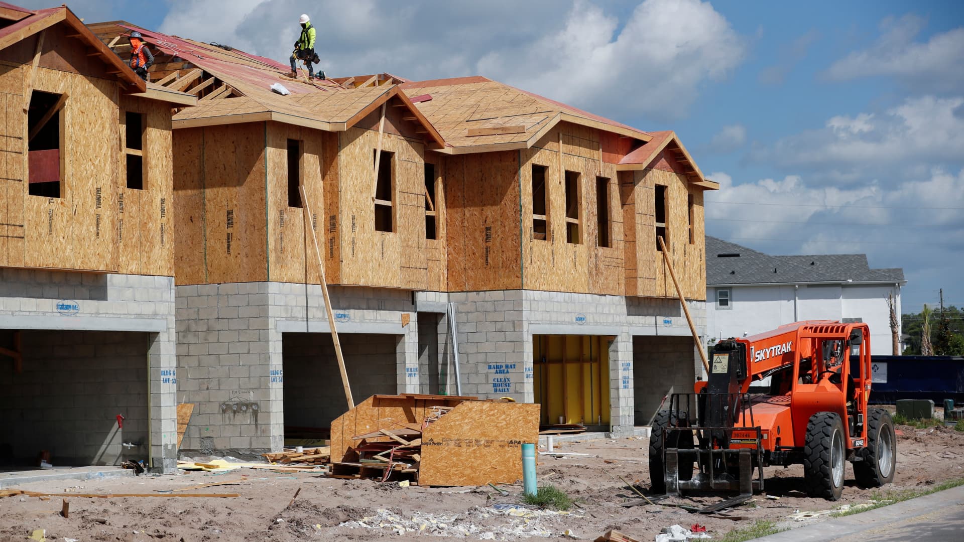 New townhomes are seen under construction while building material supplies are in high demand in Tampa, Florida, May 5, 2021.