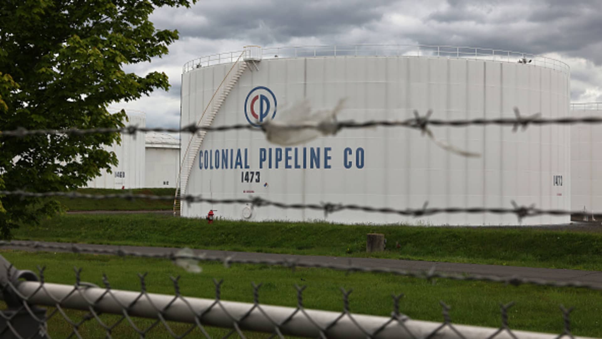 Fuel holding tanks are seen at Colonial Pipeline's Linden Junction Tank Farm on May 10, 2021 in Woodbridge, New Jersey.
