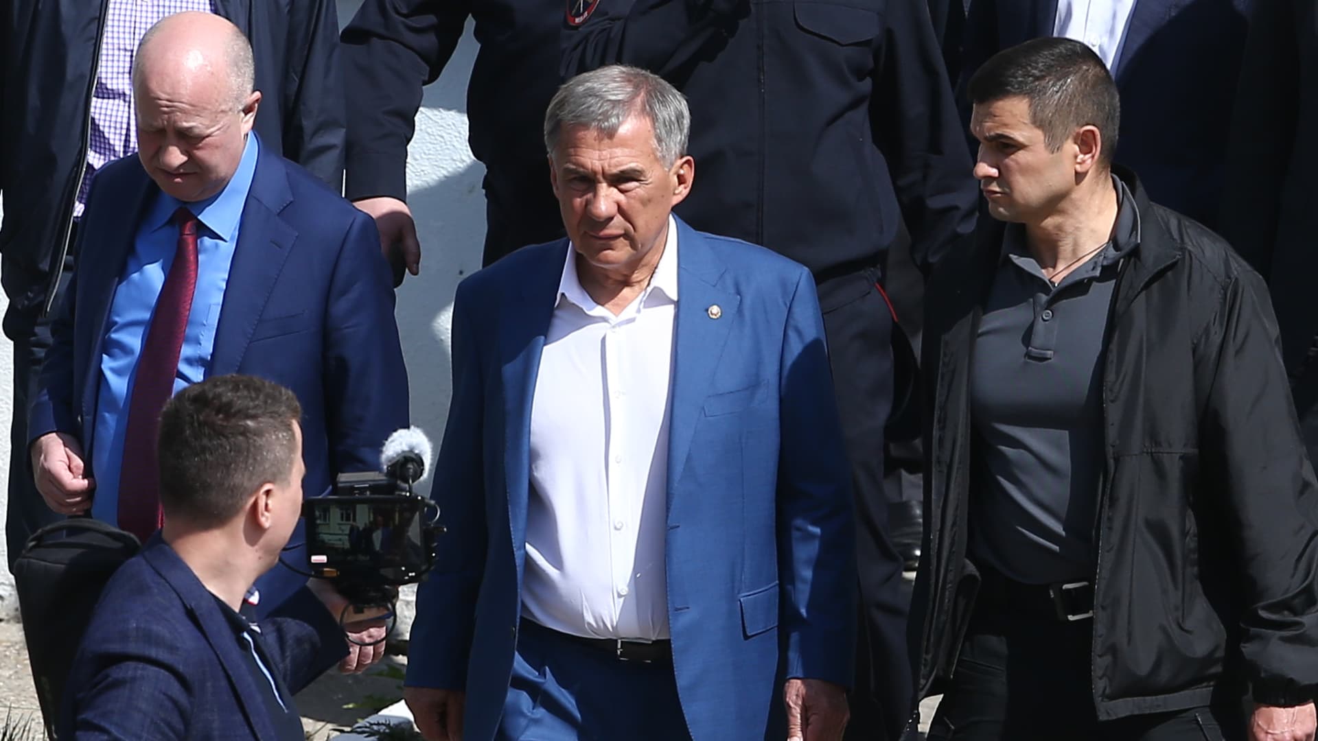 Rustam Minnikhanov, president of the Republic of Tatarstan, arrives at school No 175 where a shooting ha taken place; the number of dead is uncertain.