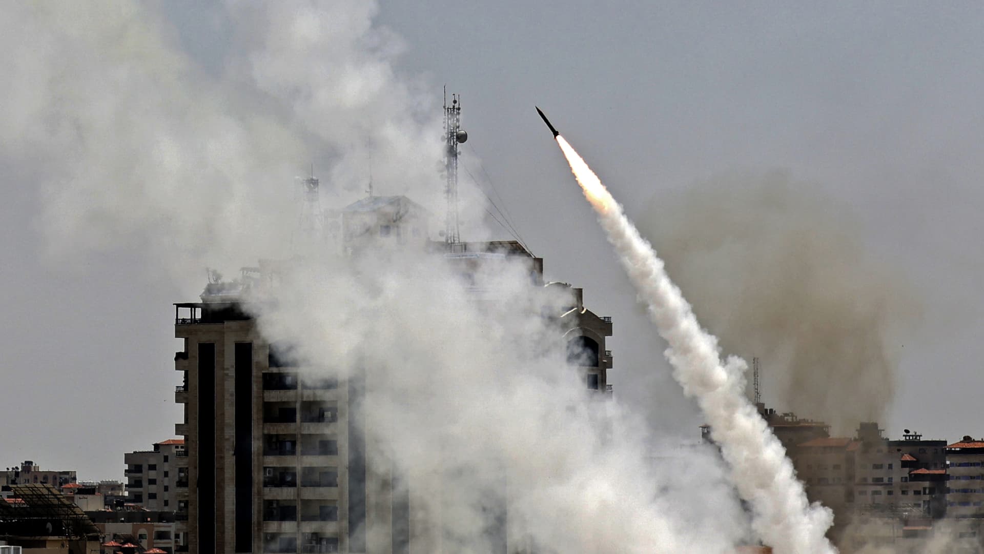 Rockets are fired from Gaza City, controlled by the Palestinian Hamas movement, toward Israel on May 11, 2021.
