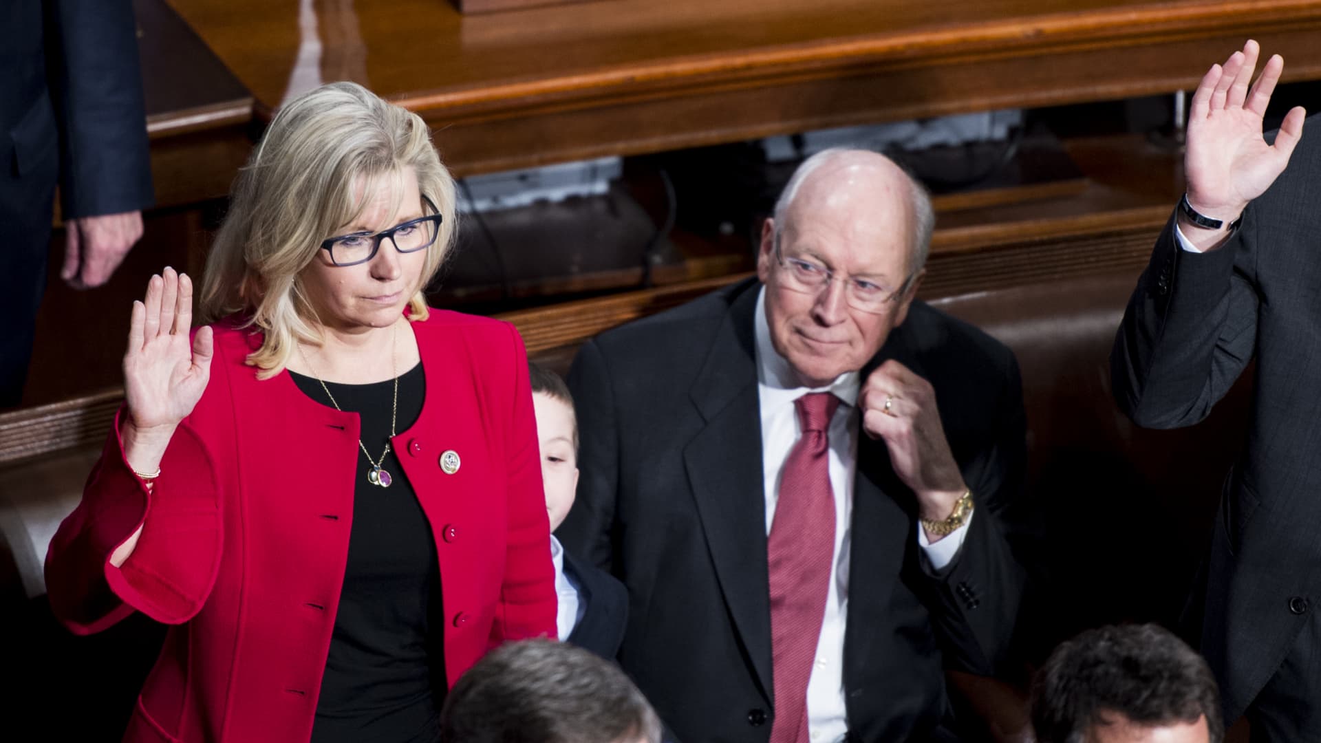Former Vice President Dick Cheney looks on as his daughter Rep. Liz Cheney, R-Wyo., takes the oath of office on the House floor on Tuesday, Jan. 3, 2017.