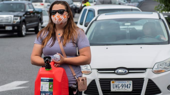 Elizabeth Dragomir had to stand in a line of vehicles waiting for gas at Costco after a cyberattack crippled the biggest fuel pipeline in the country, run by Colonial Pipeline. Dragomir's car ran out of gas in the parking lot, in Norfolk, Virginia, May 11