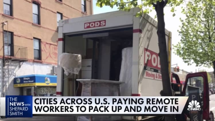 Cities across the U.S. are paying remote workers to pack up and move in