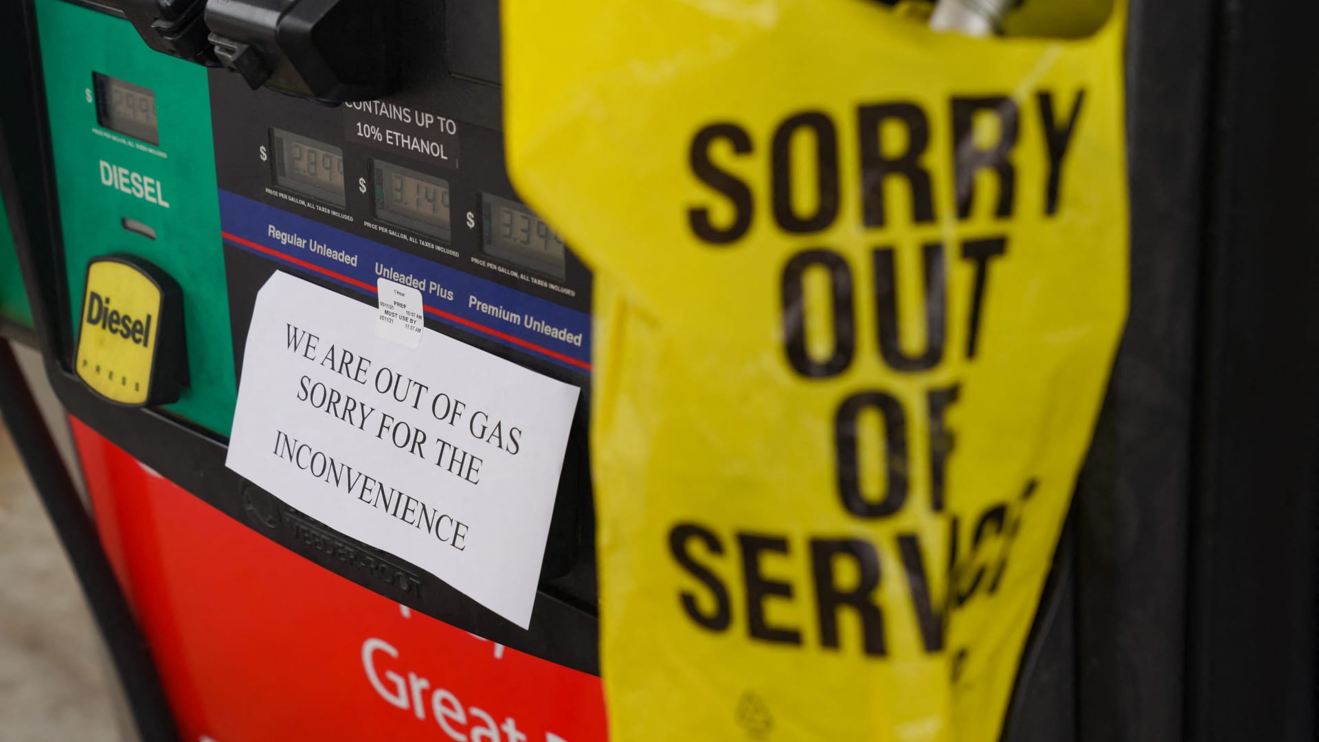 A sign warns consumers on the avaliability of gasoline at a RaceTrac gas station on May 11, 2021, in Smyrna, Georgia.