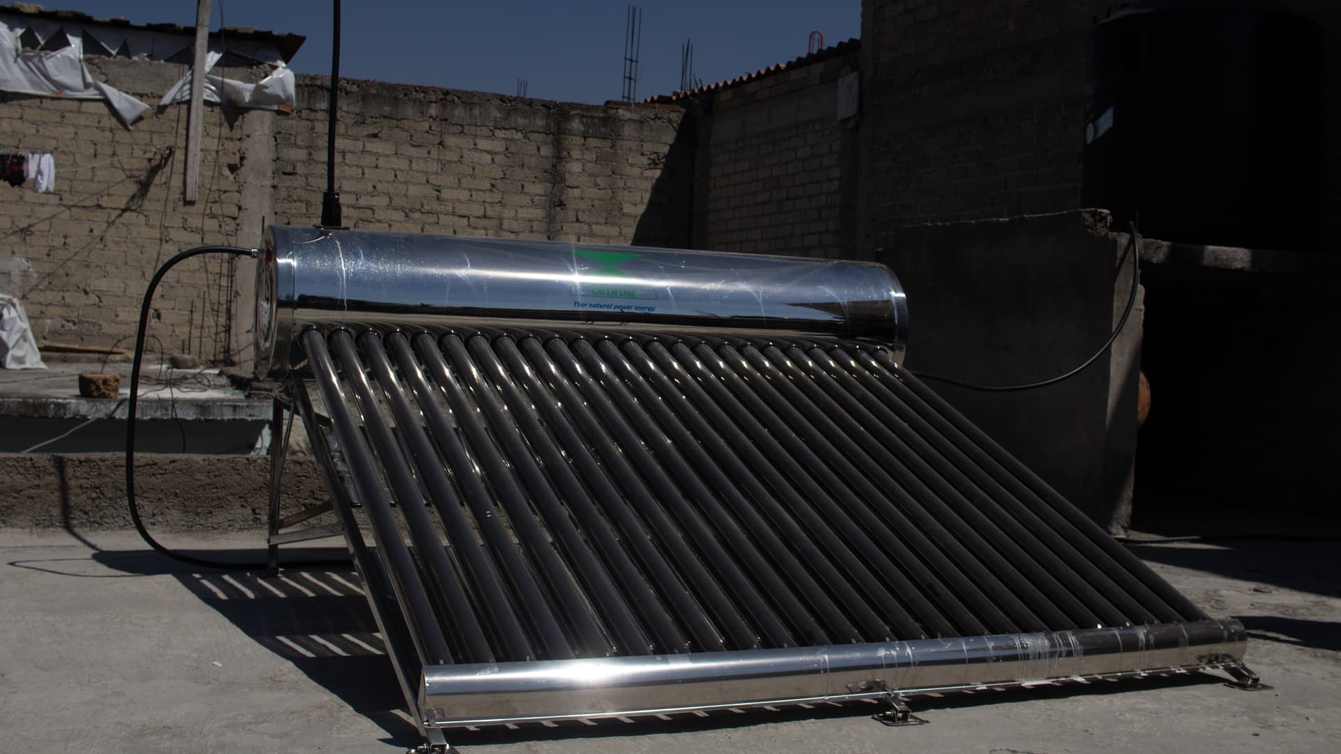 A solar-water heater installed on top of a home purchased with Graviti.