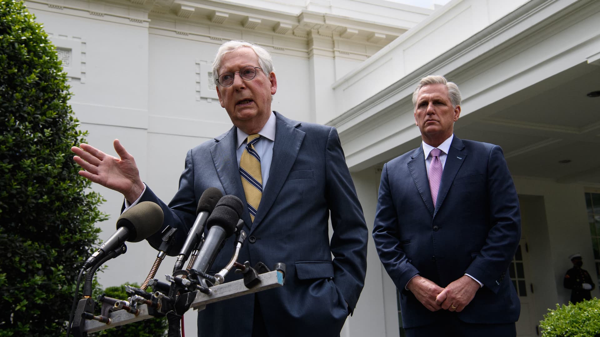 US Senate Minority Leader Mitch McConnell(L)speaks to the press as House Minority Leader Kevin McCarthy listens, following their meeting with US President Joe Biden and Democratic congressional leaders at the White House in Washington, DC, on May 12, 2021.