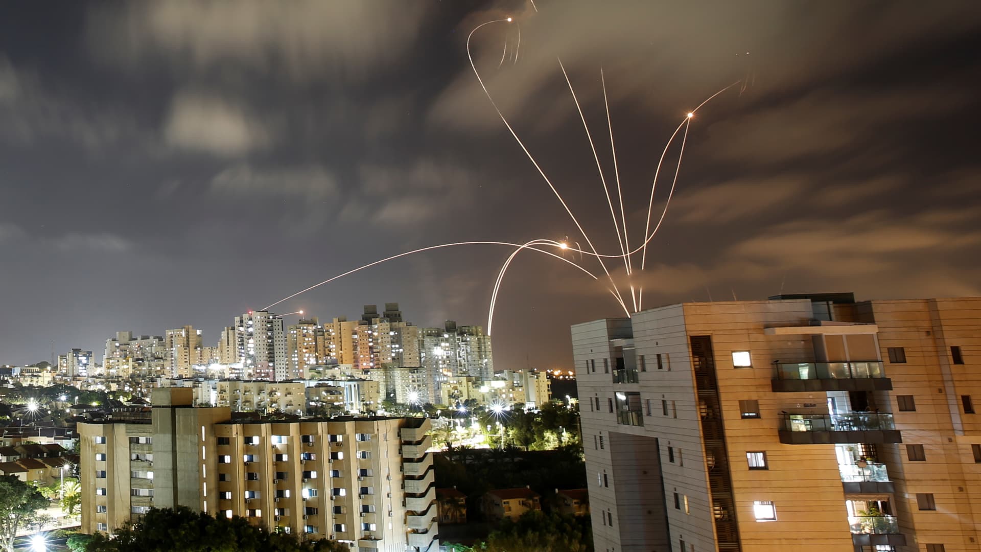 Streaks of light are seen as Israel's Iron Dome anti-missile system intercepts rockets launched from the Gaza Strip toward Israel, as seen from Ashkelon, Israel May 12, 2021.