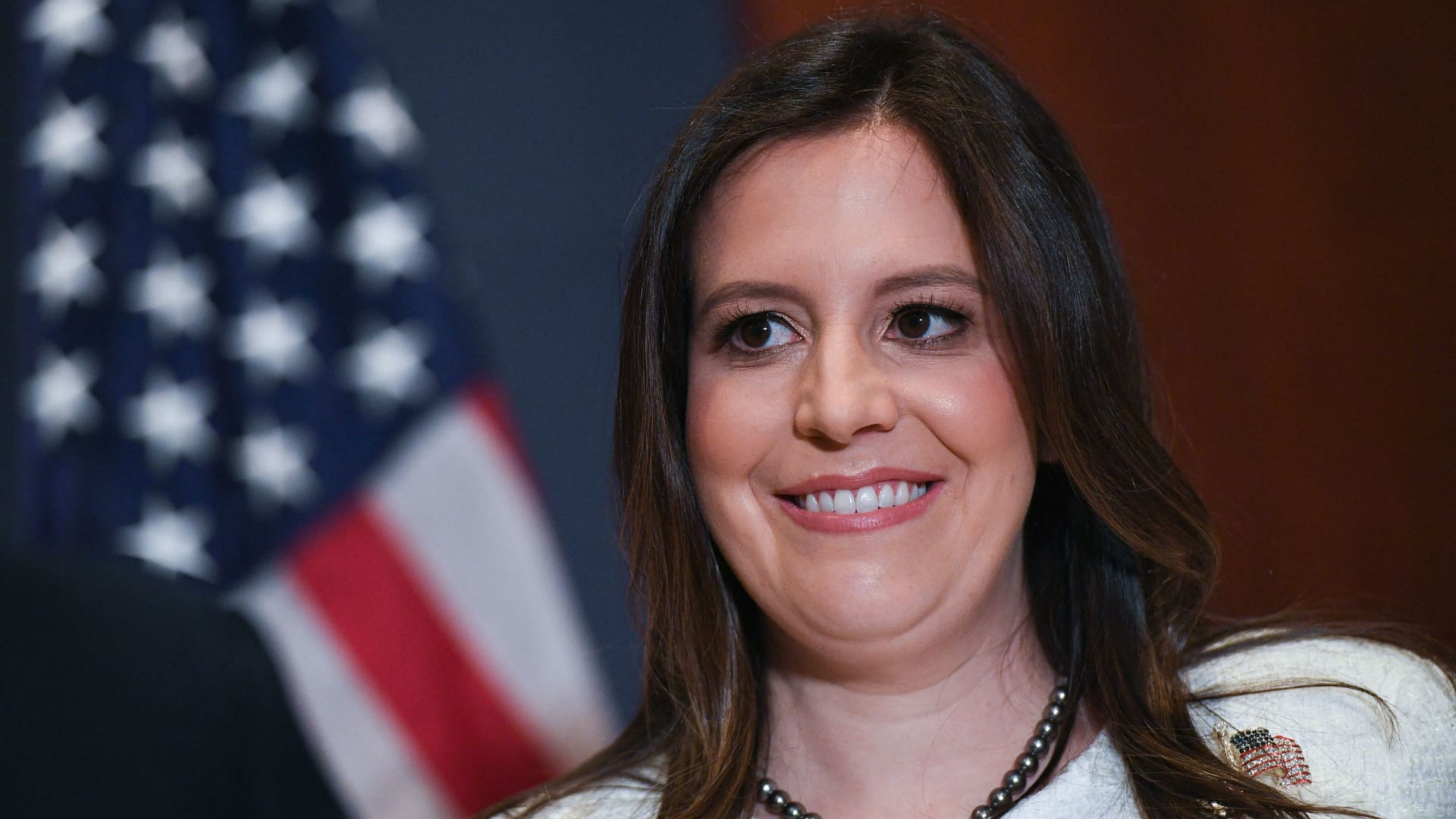 Representative Elise Stefanik (R-NY) smiles after House Republicans voted for her as their conference chairperson at the US Capitol in Washington, DC on May 14, 2021.