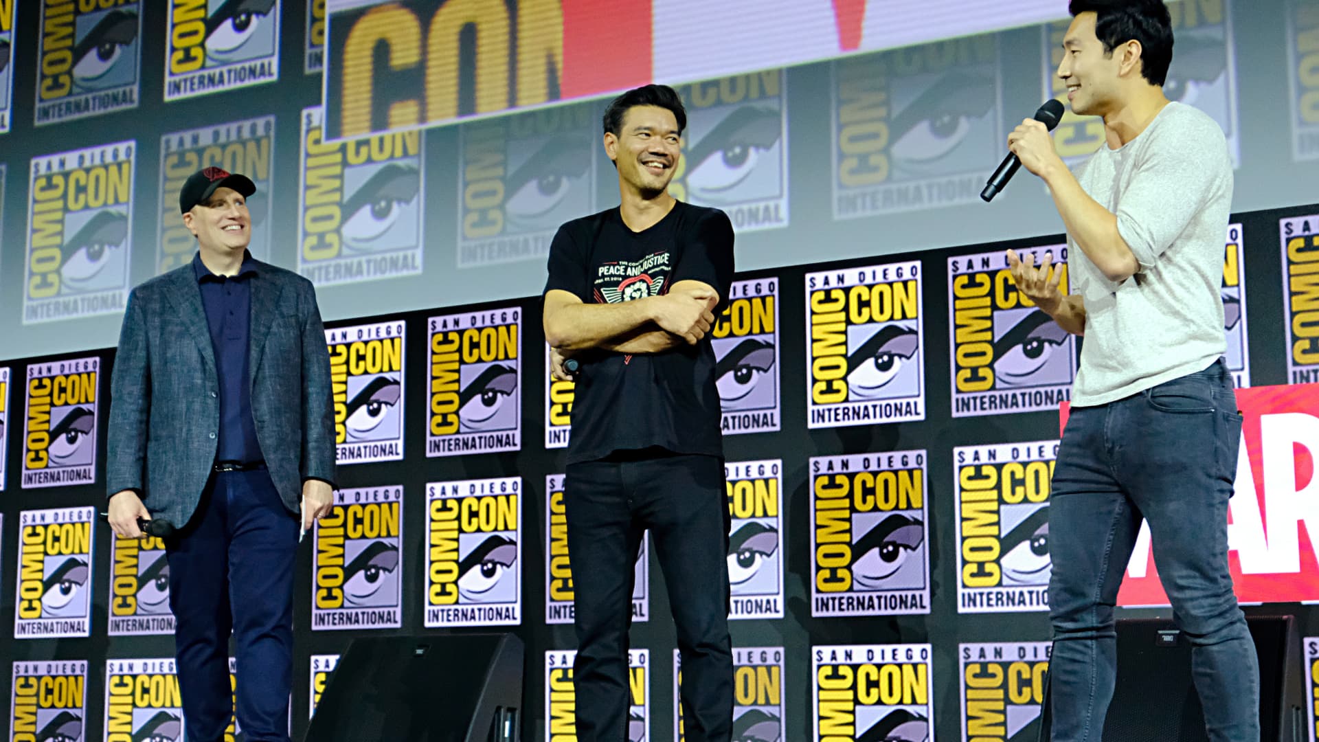 President of Marvel Studios Kevin Feige, Director Destin Daniel Cretton and Simu Liu of Marvel Studios' 'Shang-Chi and the Legend of the Ten Rings' at the San Diego Comic-Con International 2019 Marvel Studios Panel in Hall H on July 20, 2019 in San Diego, California.