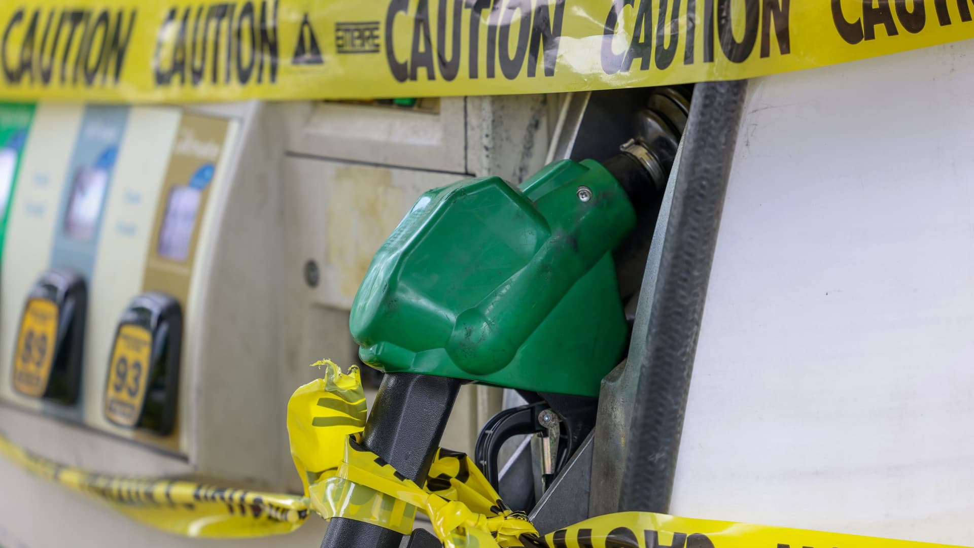 Gas pumps are roped off with a tape indicating a lack of gasoline at a gas station in Washington, U.S., May 14, 2021.