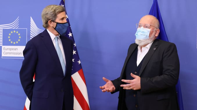 U.S. Special Presidential Envoy for Climate John Kerry (L) and European Commission vice-president in charge for European green deal Frans Timmermans (R) give a joint news conference in Brussels, Belgium on March 9, 2021.