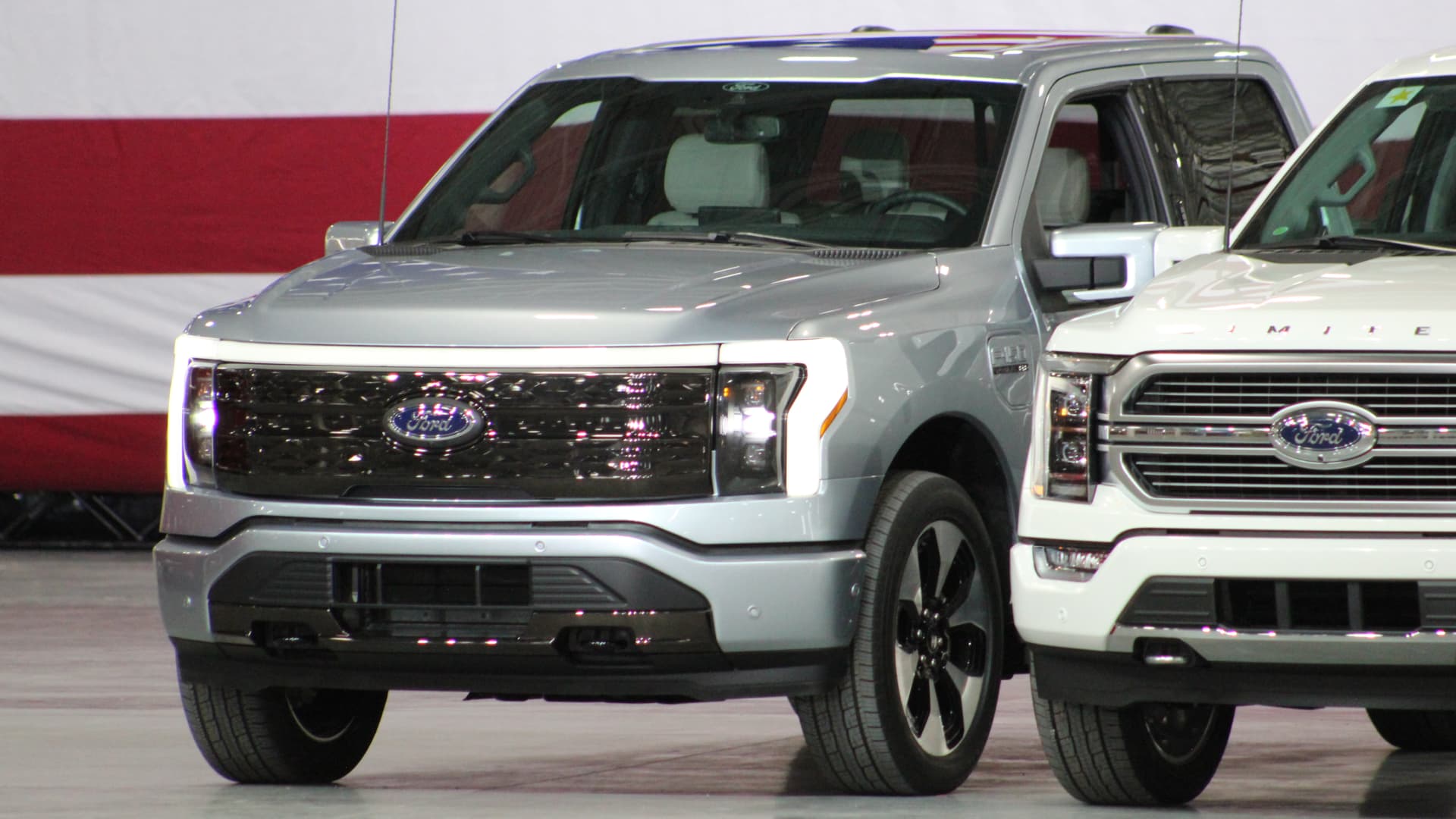 Ford displayed the new electric F-150 Lightning pickup ahead of its official reveal Wednesday night during a visit by President Joe Biden to the plant in Michigan that will produce the vehicle beginning next year.