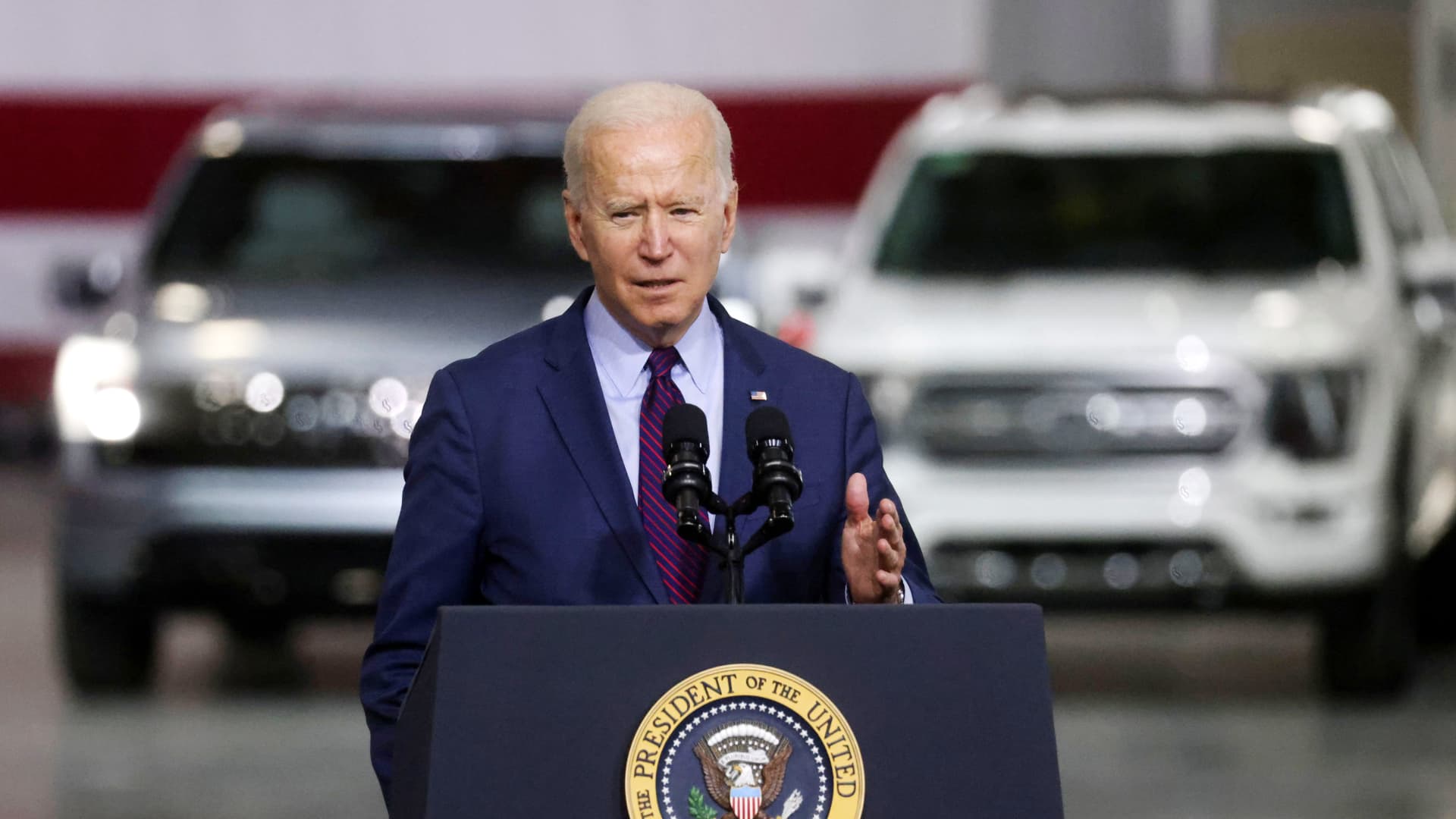 Biden digs at Tesla CEO Elon Musk on economic system, touts Ford
