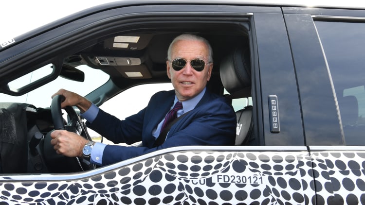 President Biden drives Ford's new electric pickup truck at the Michigan plant