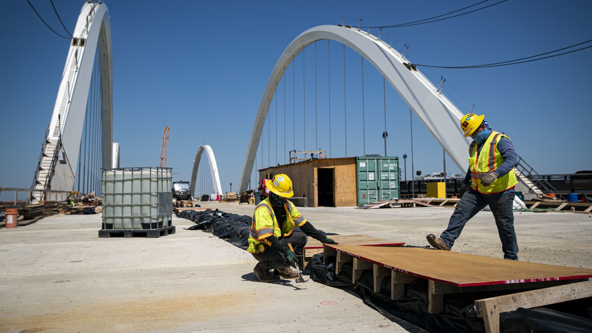 Construction workers on the Frederick Douglass Memorial Bridge in Washington, D.C., on Wednesday, May 19, 2021.