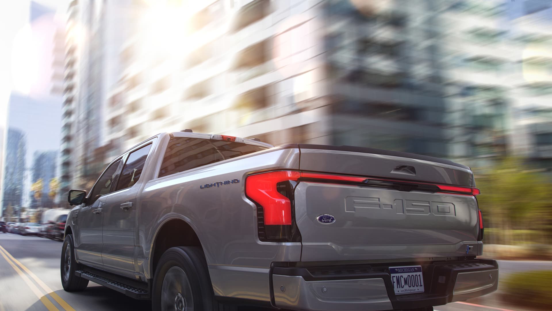 Ford F-150 Lightning's 320-mile range beats available Rivian electric pickups, but lags GMC