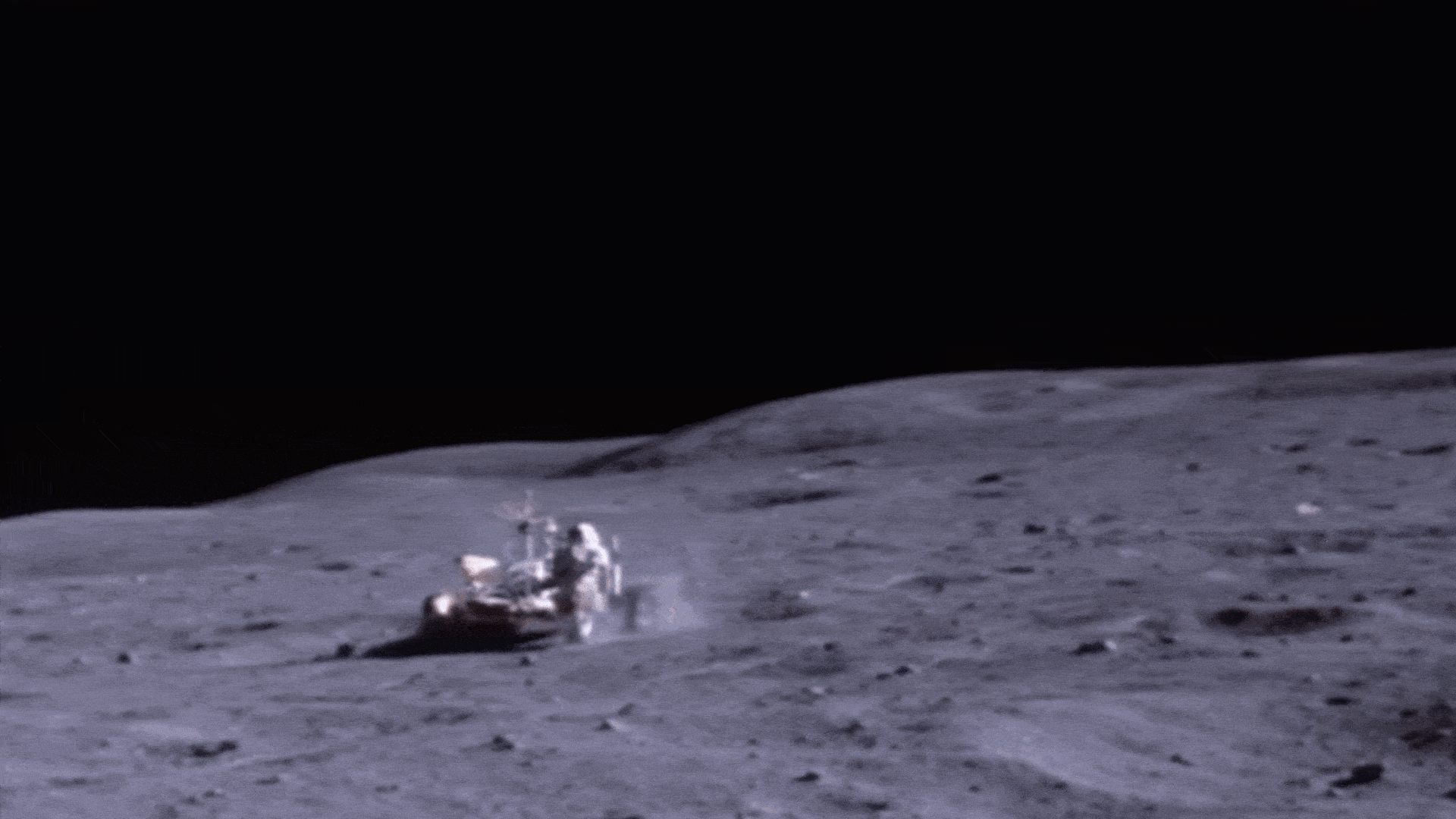 Apollo 16 astronaut John Young drives NASA's Lunar Roving Vehicle (LRV) at the Descartes landing site on the Moon on April 21, 1972.