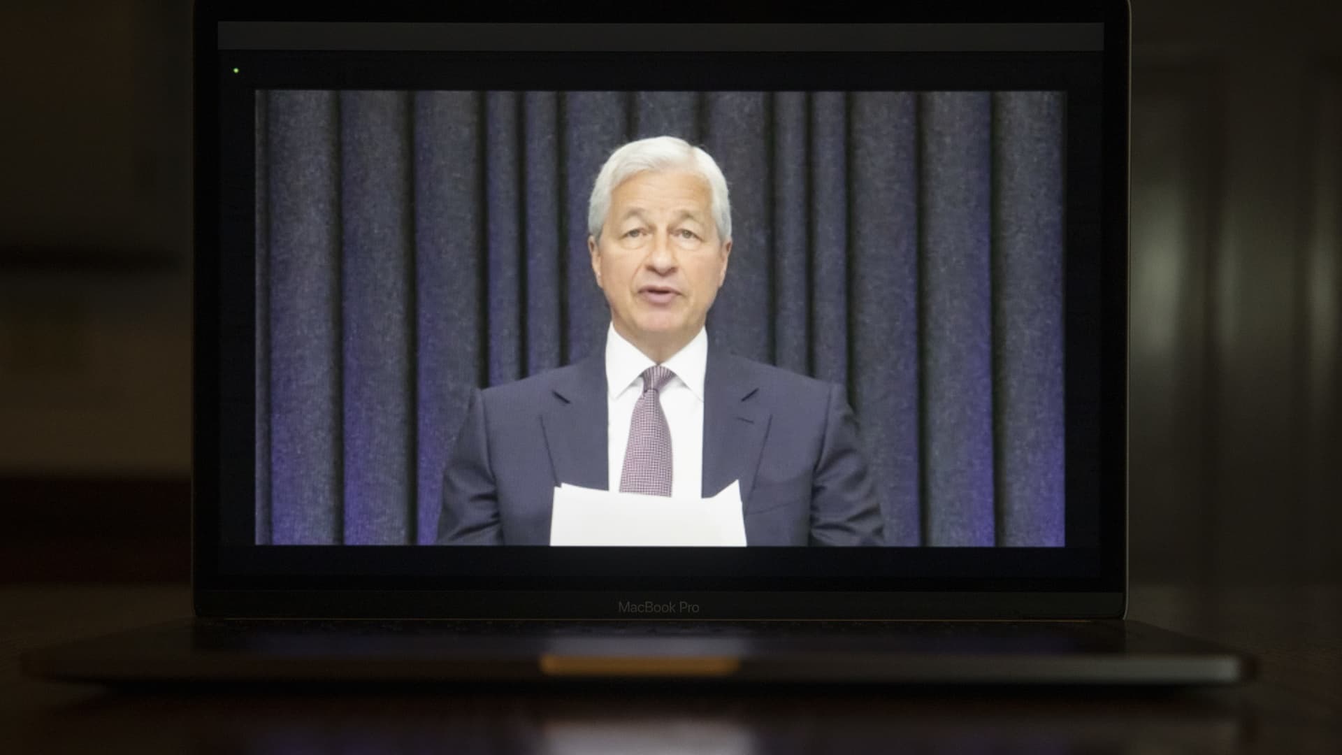 Jamie Dimon, chief executive officer of JPMorgan Chase & Co., speaks during a Senate Banking, Housing and Urban Affairs Committee hearing held virtually on a laptop computer in Tiskilwa, Illinois, U.S., on Tuesday, May 25, 2021.