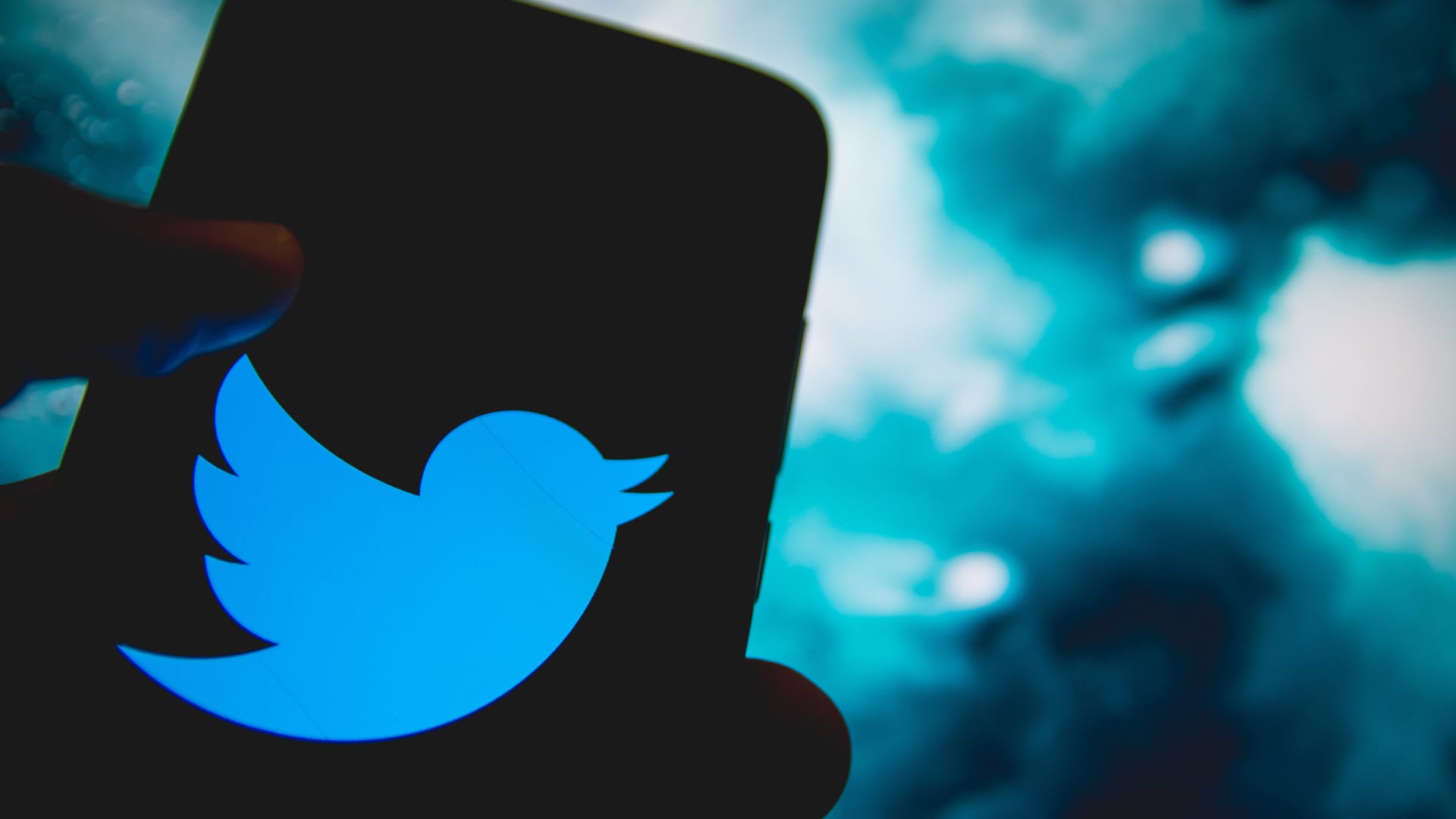 The Twitter logo is displayed on a smartphone screen on April 14, 2021.