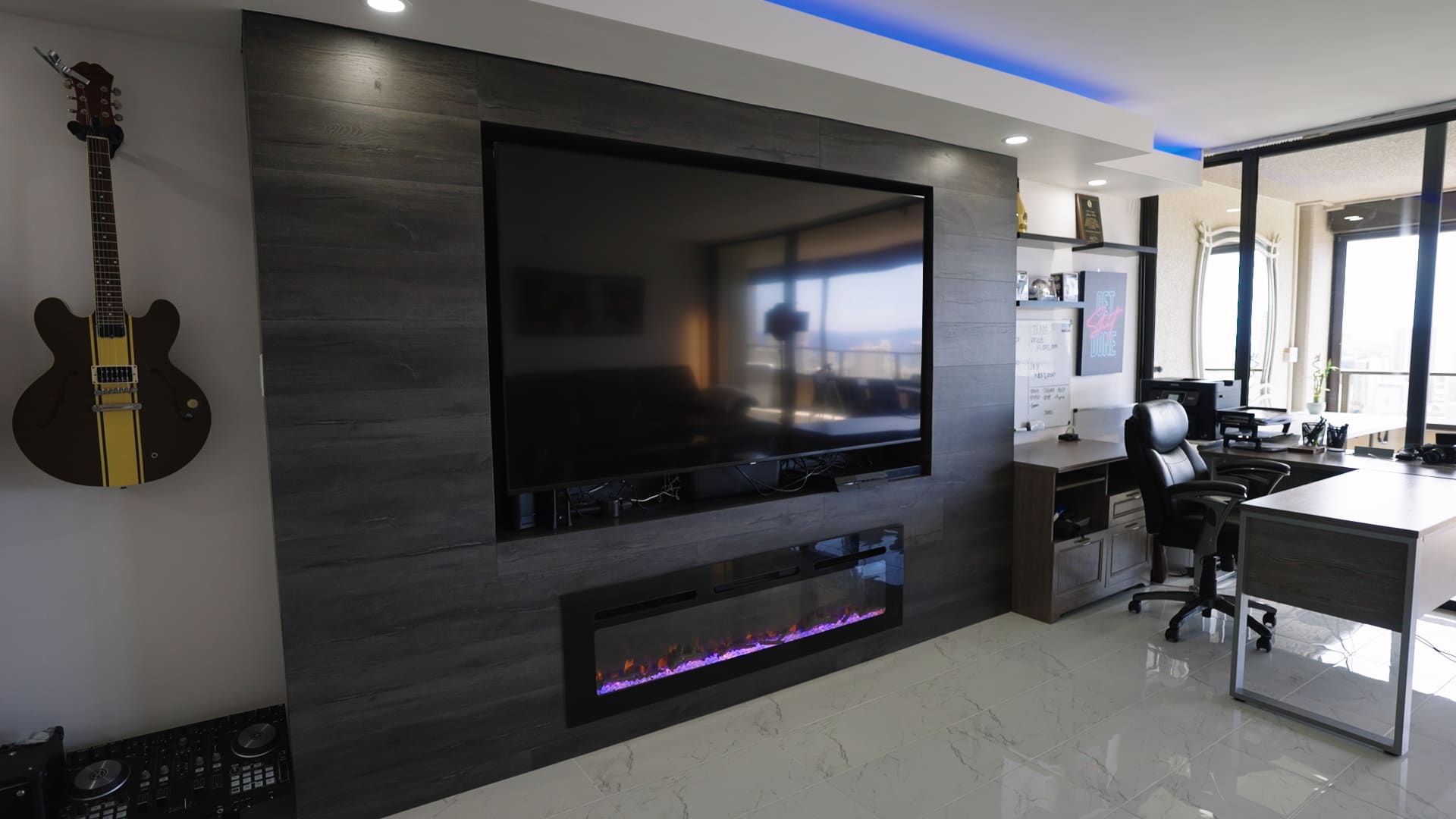 Mateo had an entertainment center and electric fireplace custom-built for his living room.