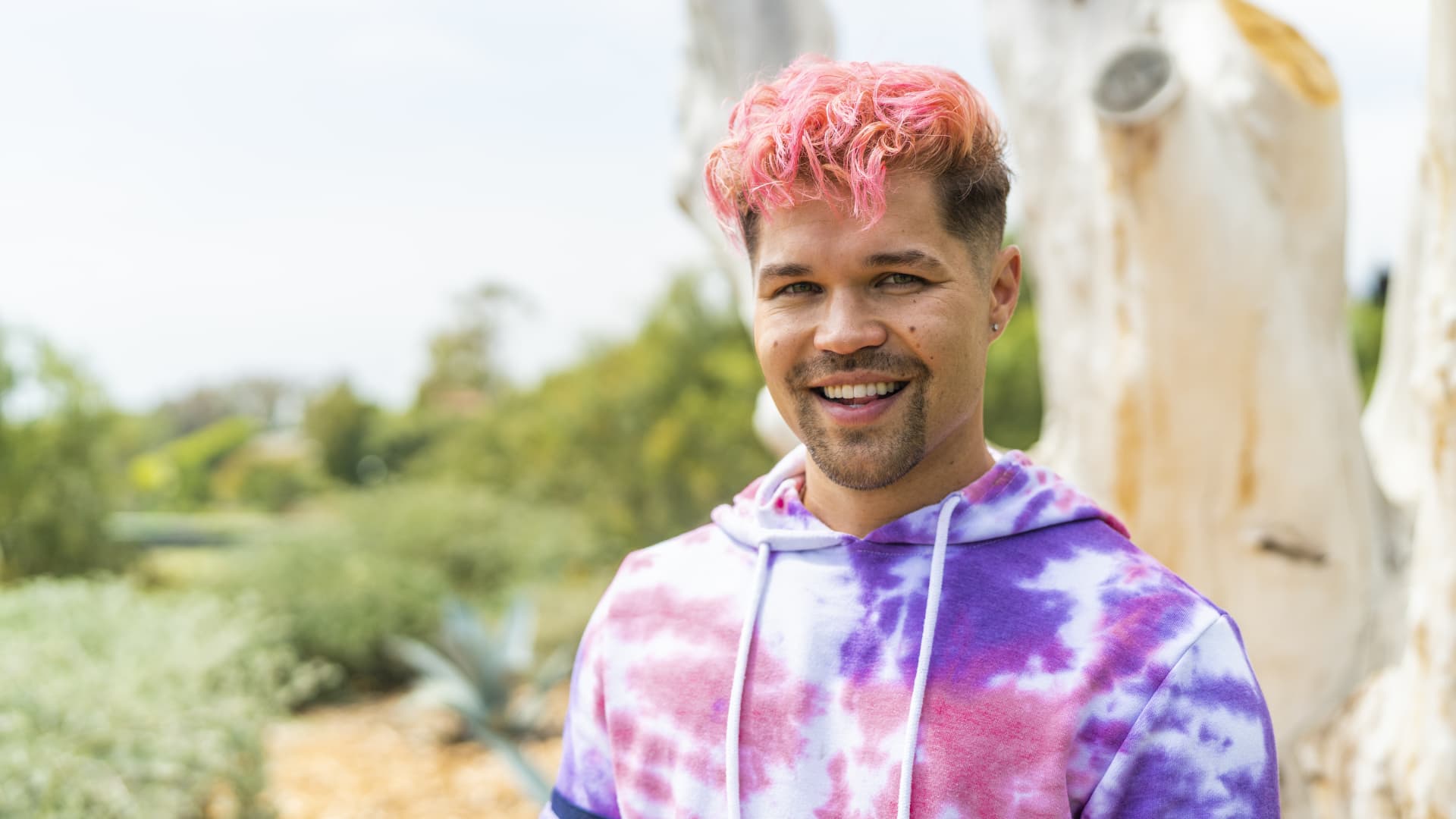 Sally Beauty is featuring people with vivid hair colors in a new ad, including Brian Terada, a LGBTQ+ advocate.