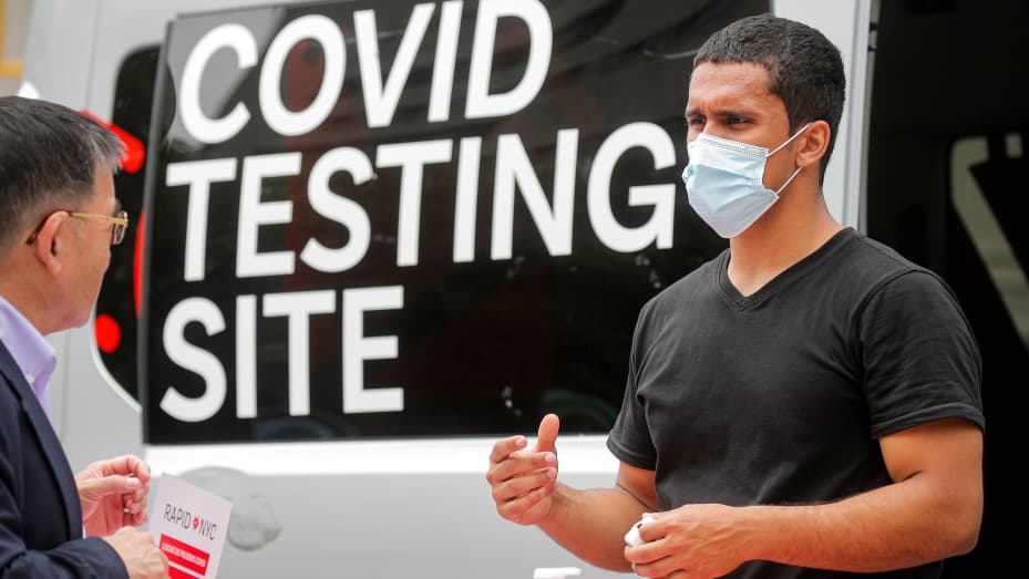A man inquires about a coronavirus disease (COVID-19) test at a mobile testing van in Brooklyn, New York, U.S., June 2, 2021.