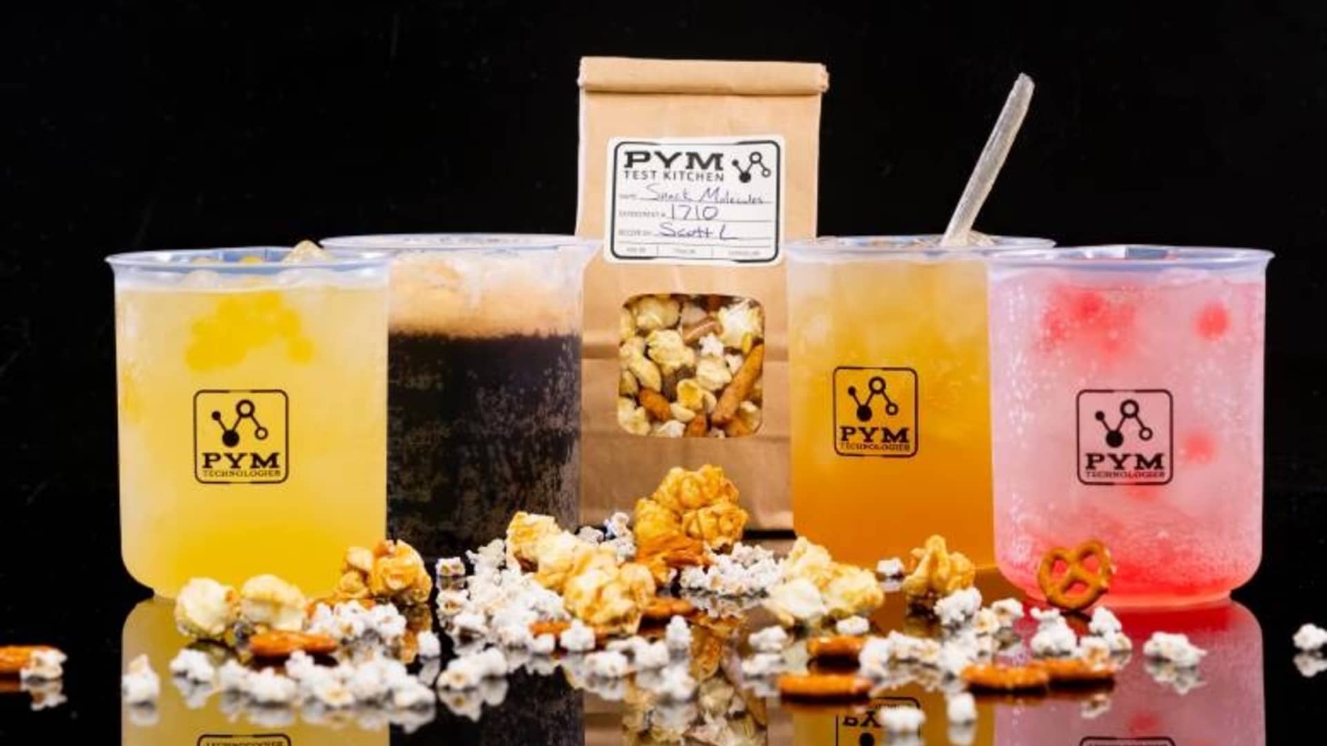 Pym Tasting Lab, adjacent to the Pym Test Kitchen in Avengers Campus at Disney California Adventure Park, features alcoholic drinks for adults, including: X-Periment, Molecular Meltdown, Honey Buzz and Particle Fizz.