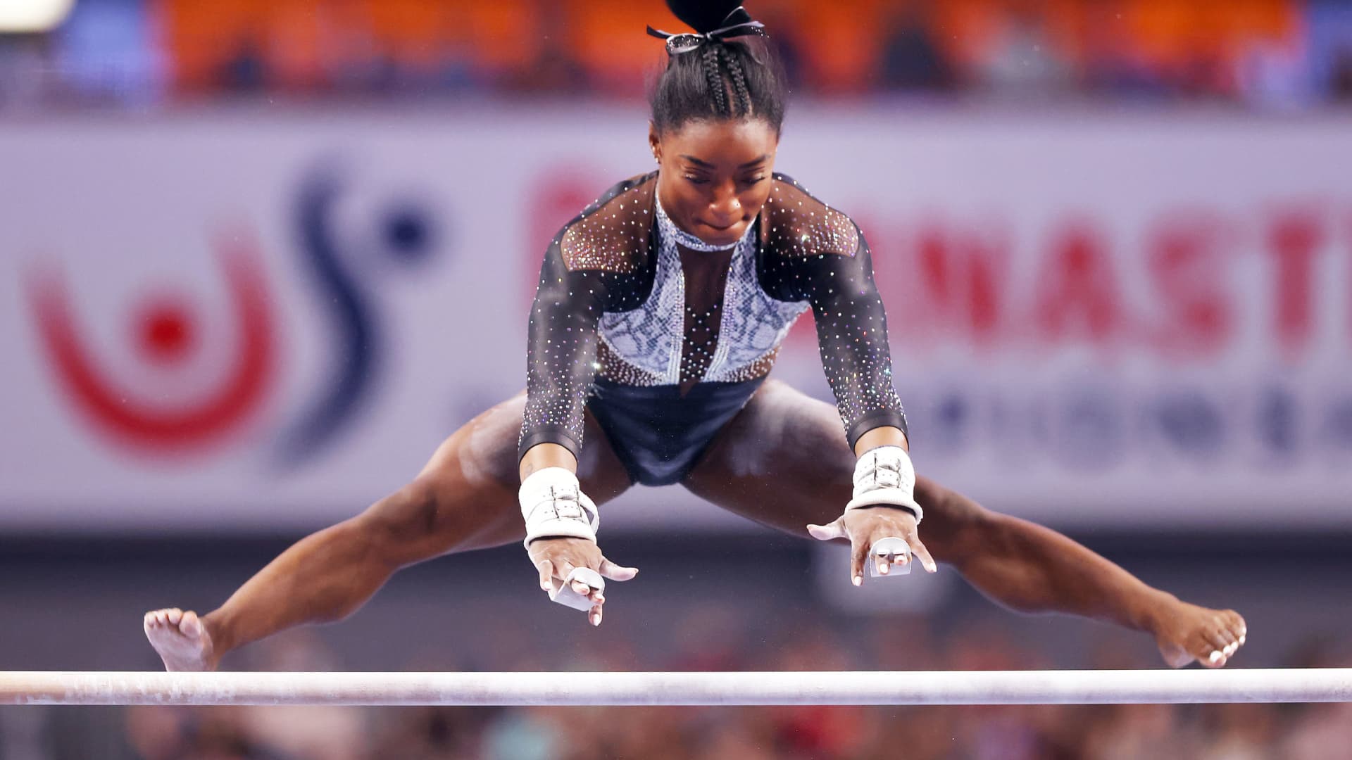 Simone Biles competes on the uneven bars prior to the Senior Women's competition of the U.S. Gymnastics Championships at Dickies Arena on June 06, 2021 in Fort Worth, Texas.