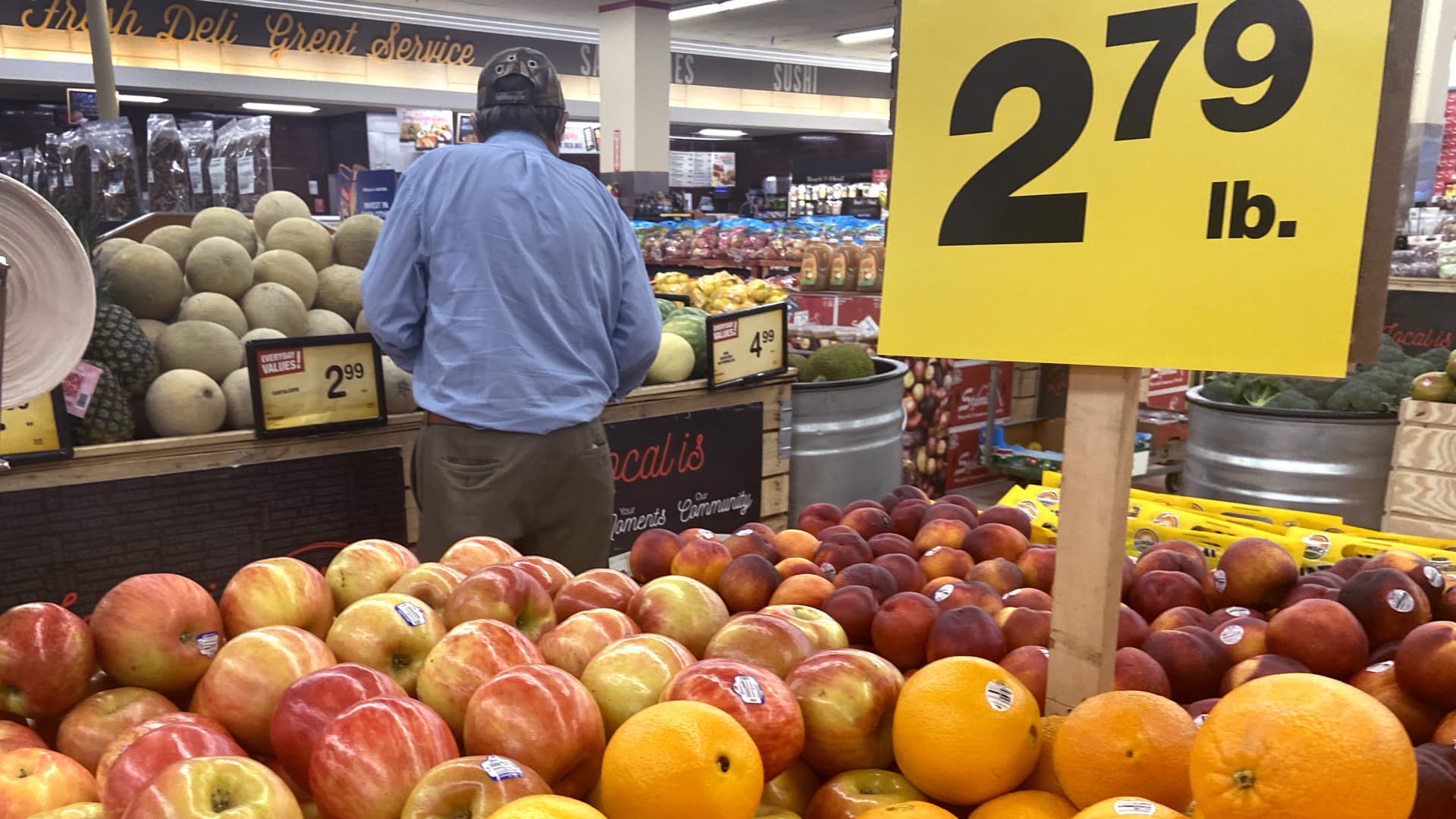 Customers shop for produce at a supermarket on June 10, 2021 in Chicago, Illinois.