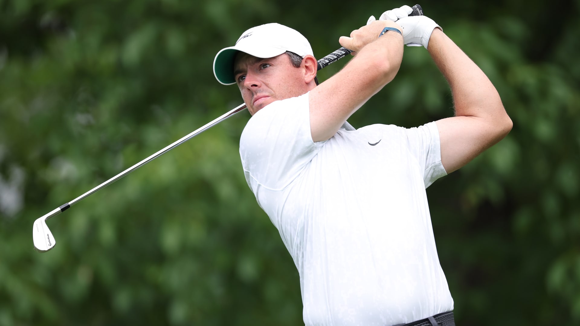 Rory McIlroy of Northern Ireland plays his shot from the 14th tee during the continuation of the first round of The Memorial Tournament at Muirfield Village Golf Club on June 04, 2021 in Dublin, Ohio.