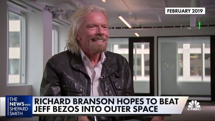 Billionaire space race pits Blue Origin's Bezos against Virgin Galactic's Branson
