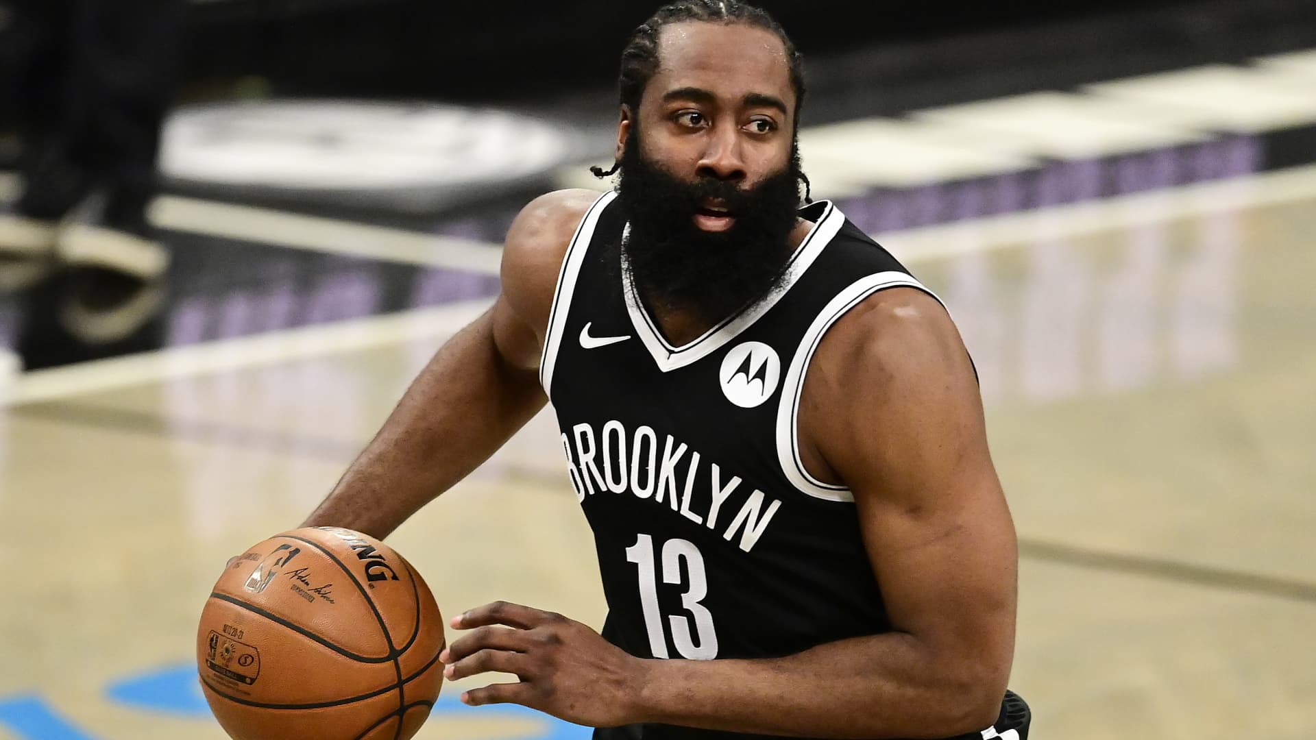 James Harden #13 of the Brooklyn Nets handles the ball against the Boston Celtics in Game One of the First Round of the 2021 NBA Playoffs at Barclays Center at Barclays Center on May 22, 2021 in New York City.