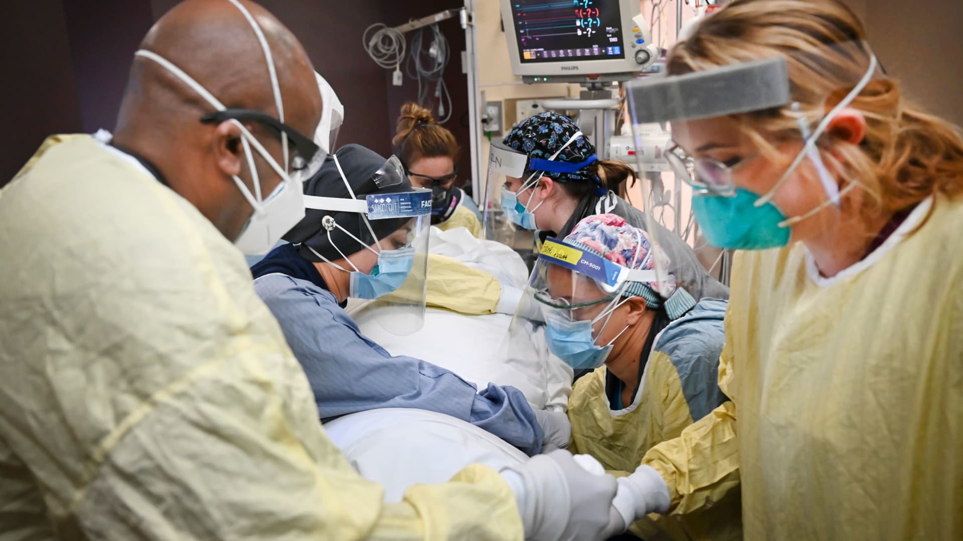 Healthcare workers in North Memorial's 2019s South Six and South Seven Intensive Care Units treated patients critically ill with COVID-19 on Monday, Dec. 7, 2020 at North Memorial Health Hospital in Robbinsdale, Minn.
