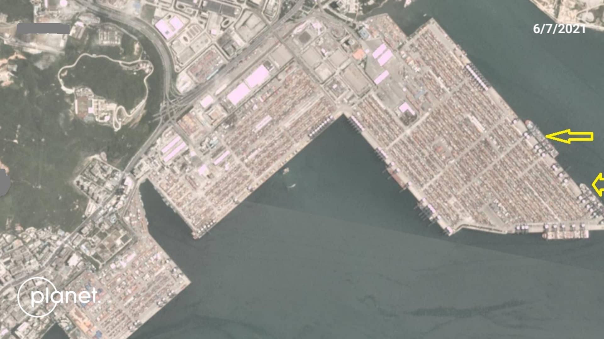 Port of Yantian on June 8, 2021. Arrows point to vessels at berth. The photo shows containers piling up at the port but few ships to export the goods after port officials temporarily shut down operations to contain a Covid outbreak in late May.