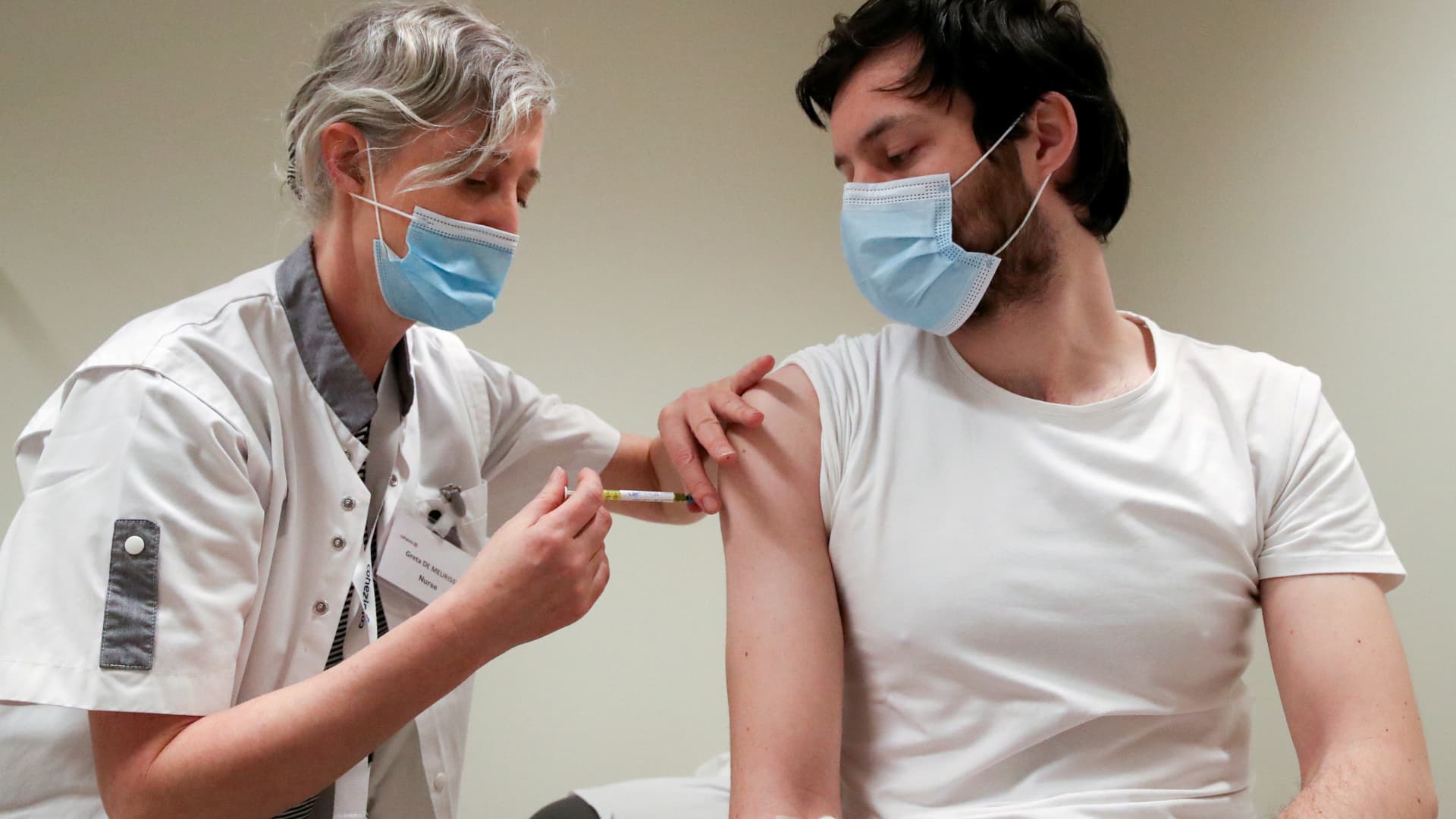 A volunteer receives a dose of CureVac vaccine or a placebo during a study by the German biotech firm CureVac as part of a testing for a new vaccine against the coronavirus disease (COVID-19), in Brussels, Belgium March 2, 2021.