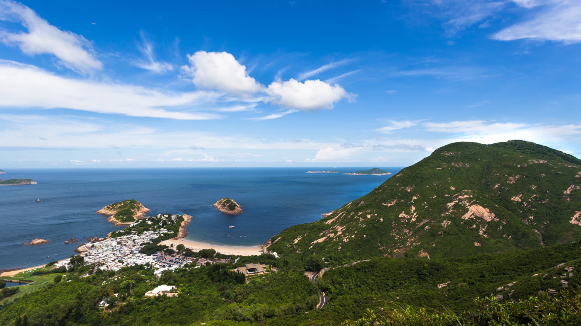 The view along Dragon's Back, a popular hiking trail in Sheck O Country Park on Hong Kong Island.