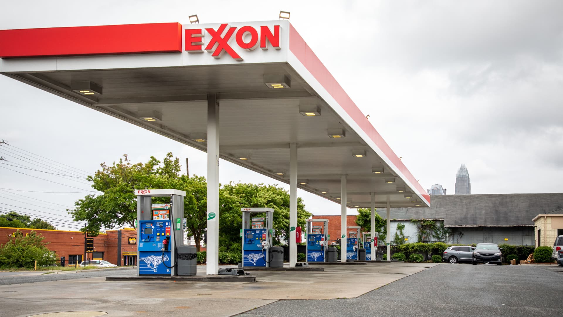 Gas pumps sit empty at an Exxon gas station in Charlotte, North Carolina on May 12, 2021.