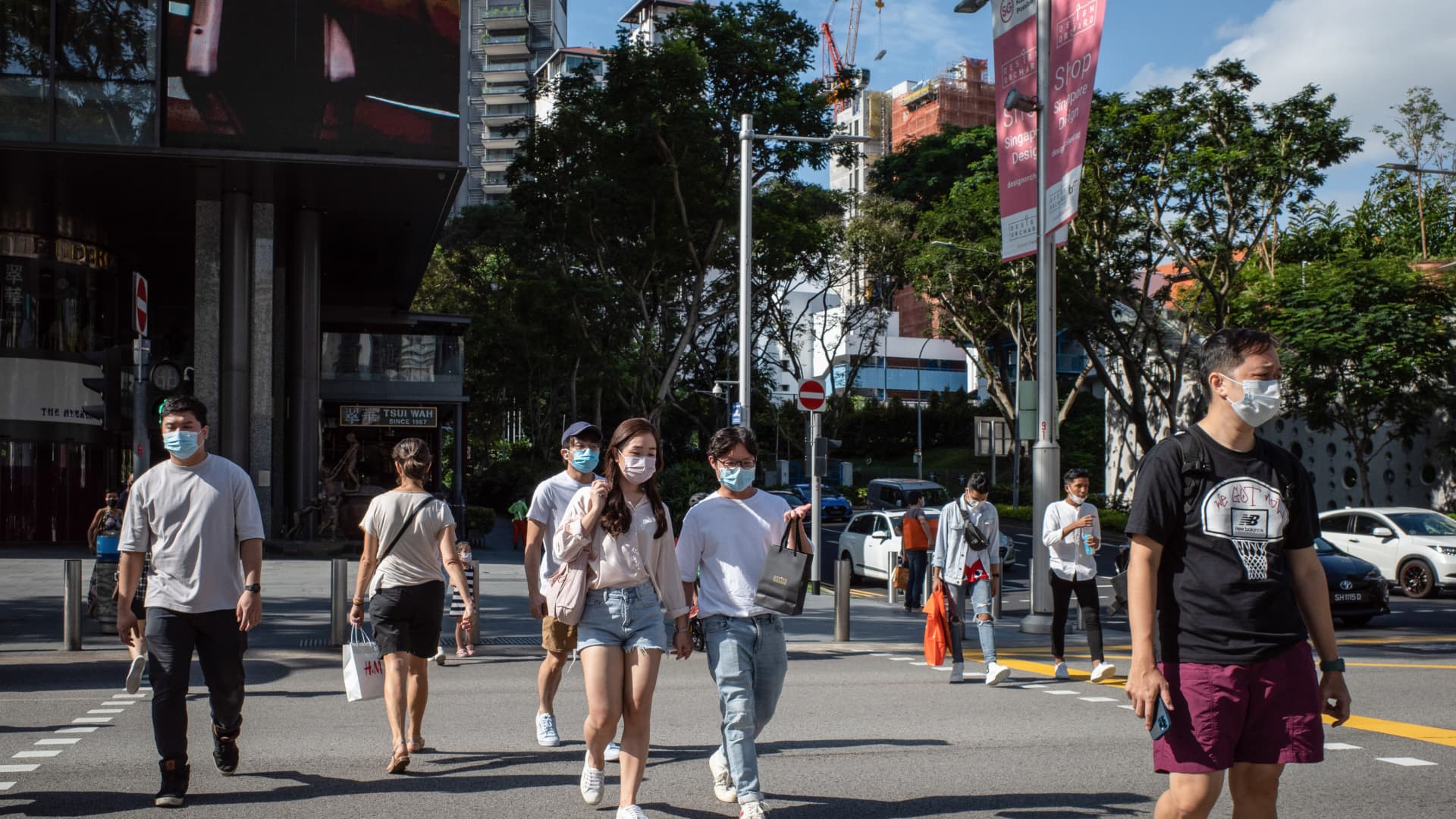 People wearing face masks as a preventive measure against the spread of Covid-19 in Singapore.