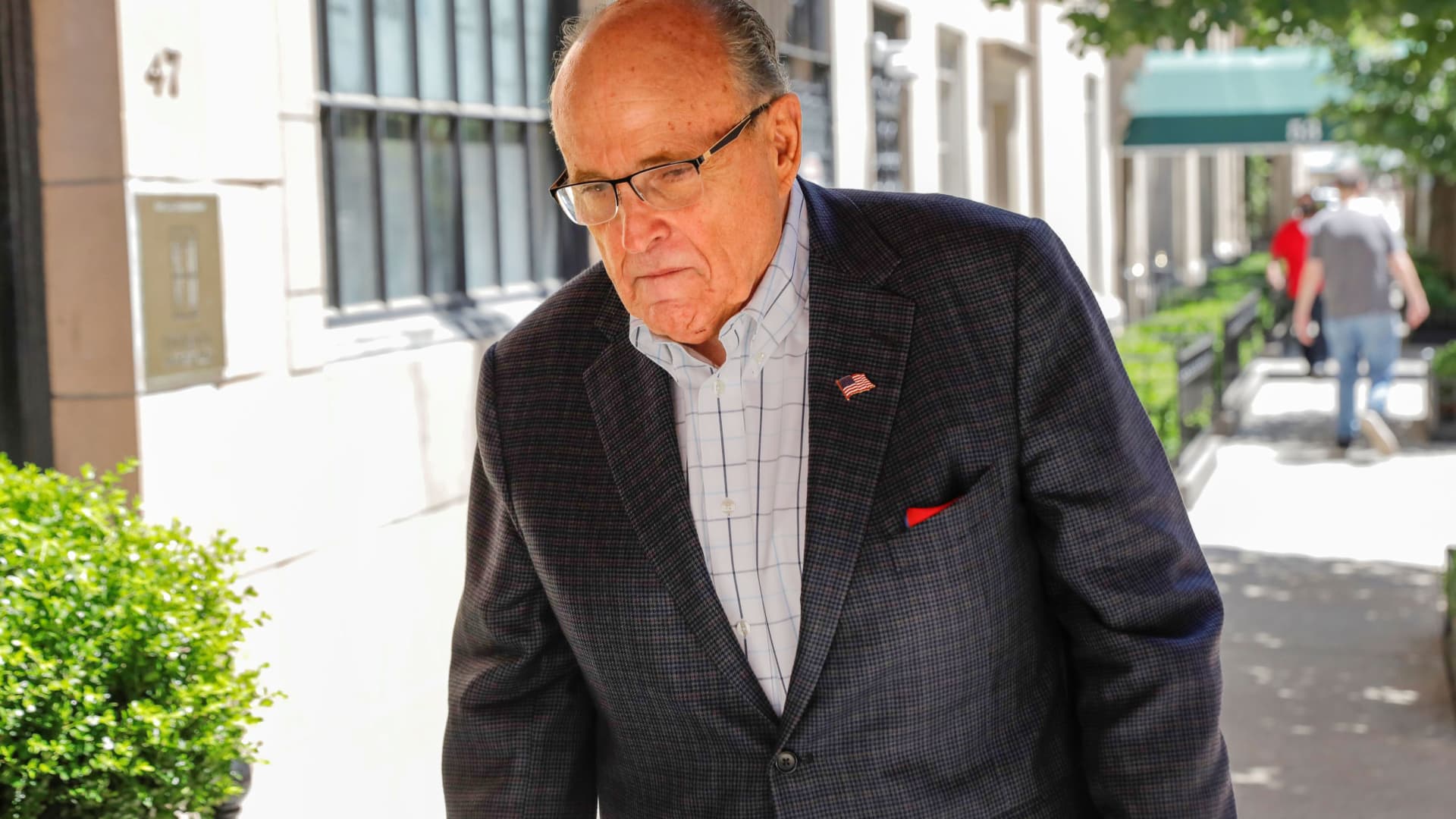 Former New York City Mayor Rudy Giuliani arrives at his apartment building after the suspension of his law license in Manhattan in New York City, New York, June 24, 2021.