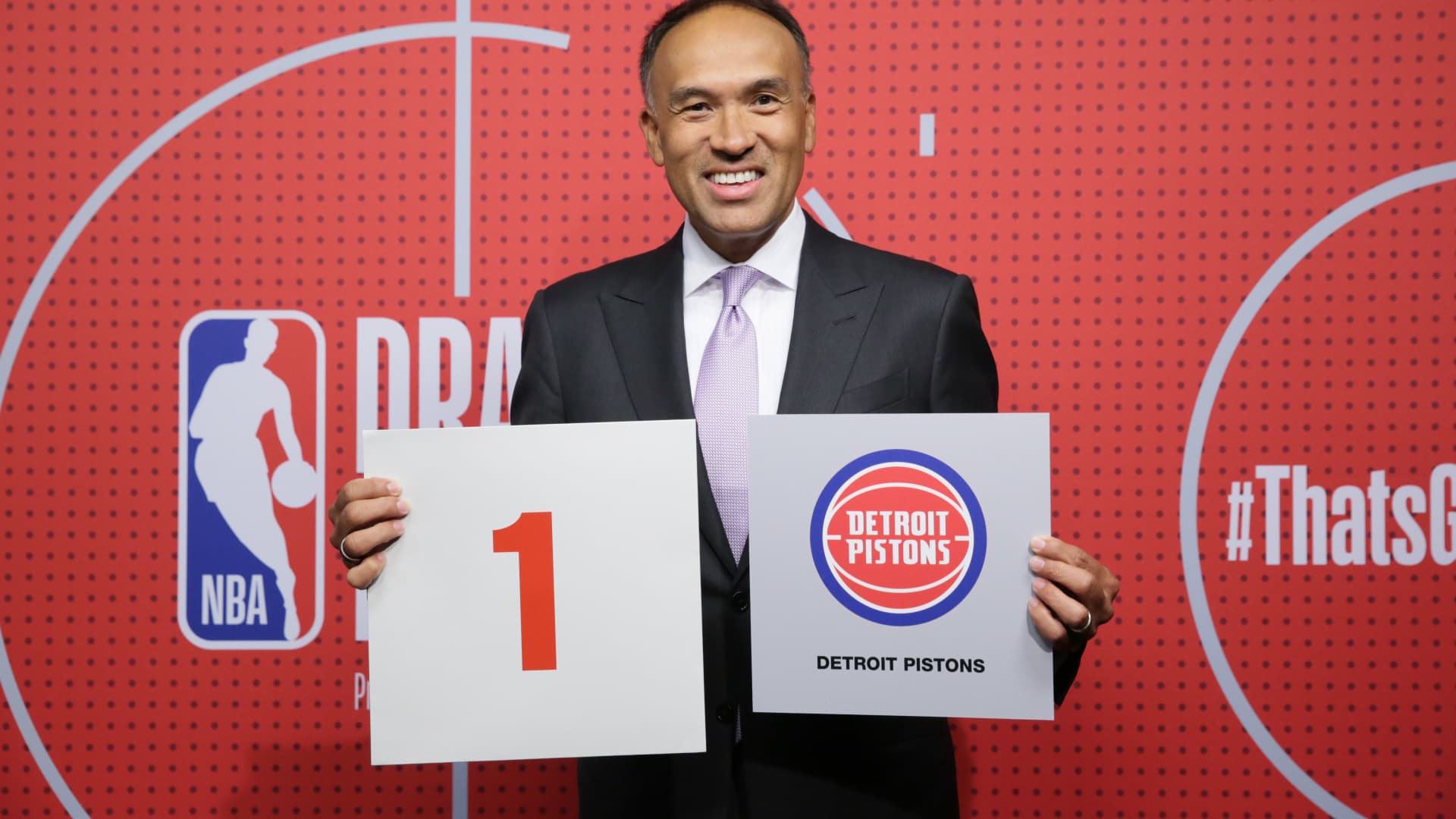 Deputy Commissioner of the NBA, Mark Tatum holds up the card of the Detroit Pistons after they get the 1st overall pick in the NBA Draft during the 2021 NBA Draft Lottery on June 22, 2021 at the NBA Entertainment Studios in Secaucus, New Jersey.