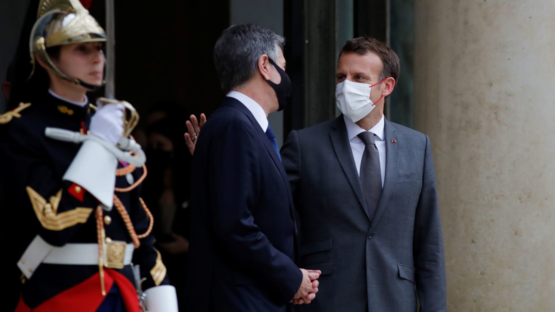French President Emmanuel Macron accompanies U.S. Secretary of State Antony Blinken after a meeting at the Elysee Palace in Paris, France, June 25, 2021.