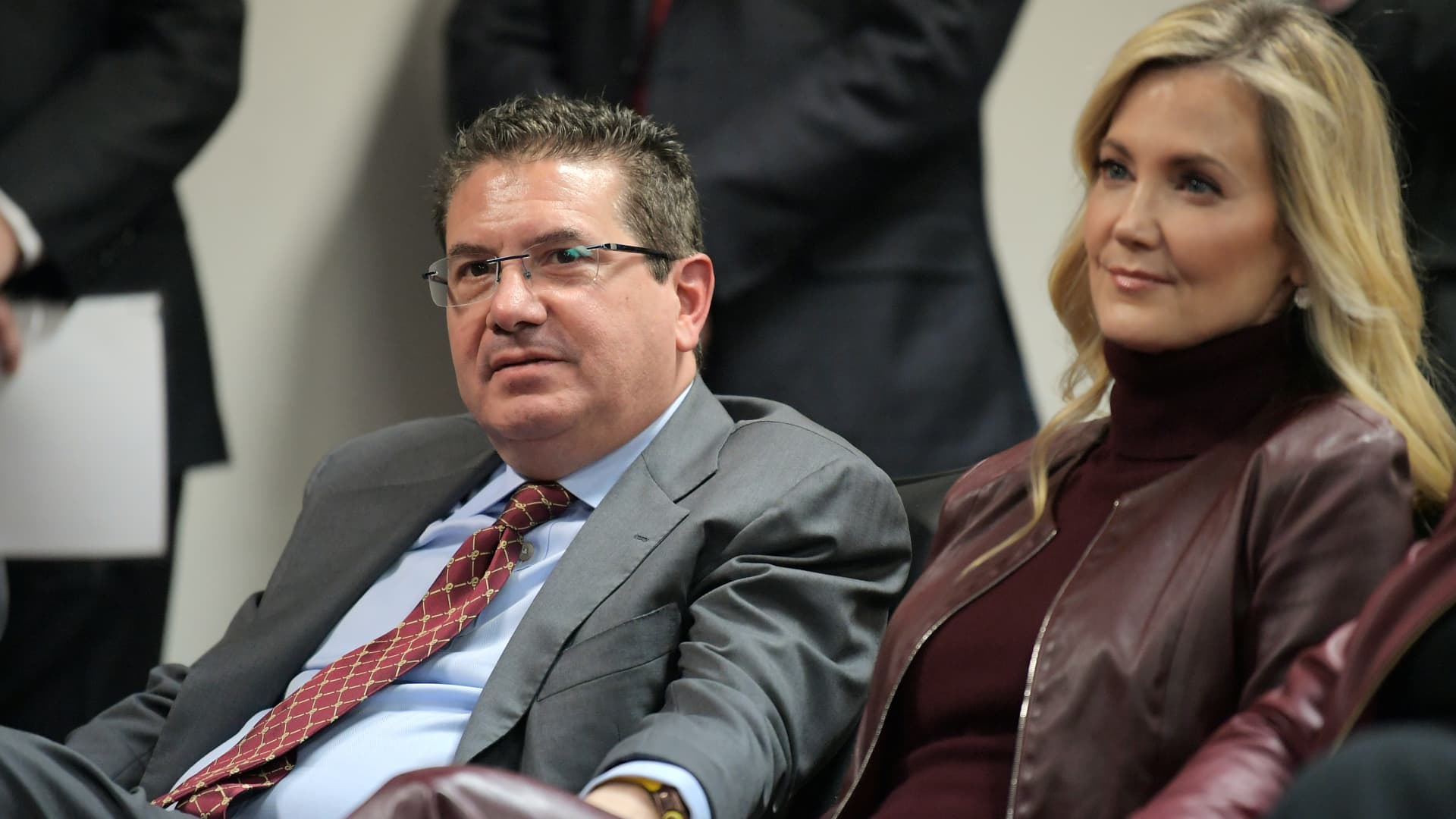 Washington Redskins owner Dan Snyder, left, sits with his wife Tanya Snyder sin the audience as Ron Rivera is introduced as the Washington Redskins new had coach at a Redskins Park press conference in Ashburn, VA on January 2, 2020.