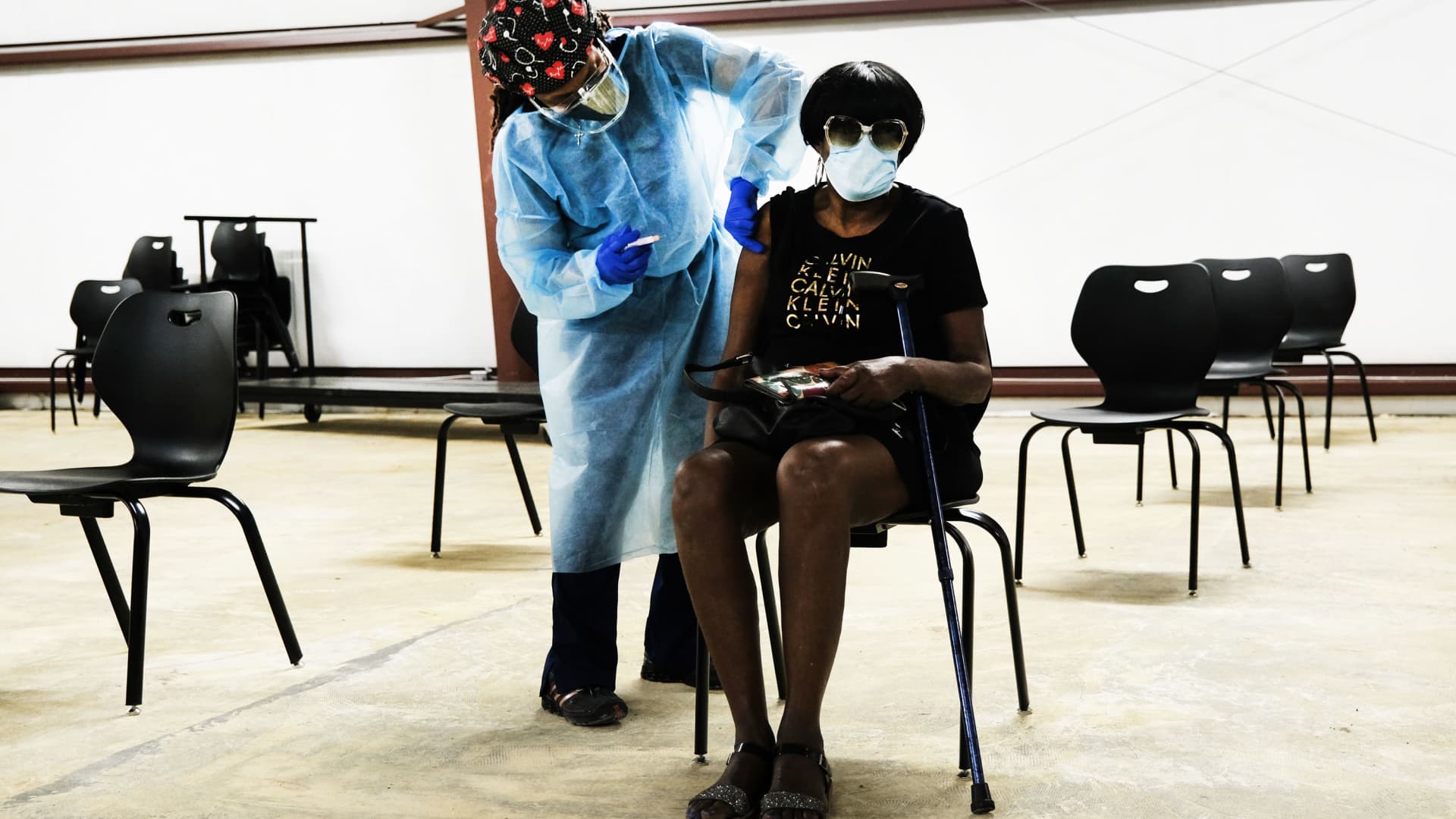 Patricia Cole gets a shot of the Moderna Covid-19 vaccination from a medical worker at a pop-up clinic operated by Delta Health Center in this rural Delta community on April 27, 2021 in Hollandale, Mississippi.