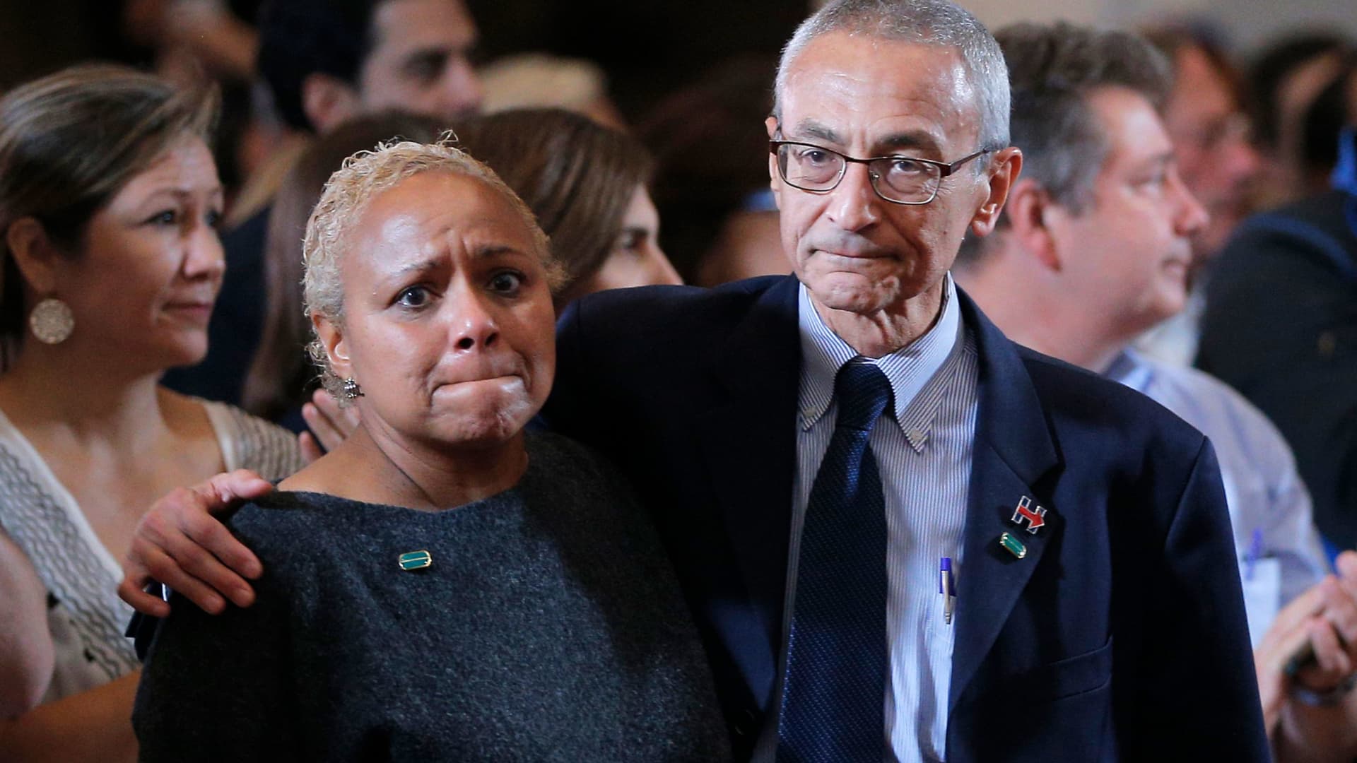 Campaign Chairman John Podesta hugs Tina Flournoy, chief of staff to former U.S. President Bill Clinton, as they attend an event being held by Hillary Clinton to address her staff and supporters about the results of the U.S. election at a hotel in the Manhattan borough of New York, November 9, 2016.