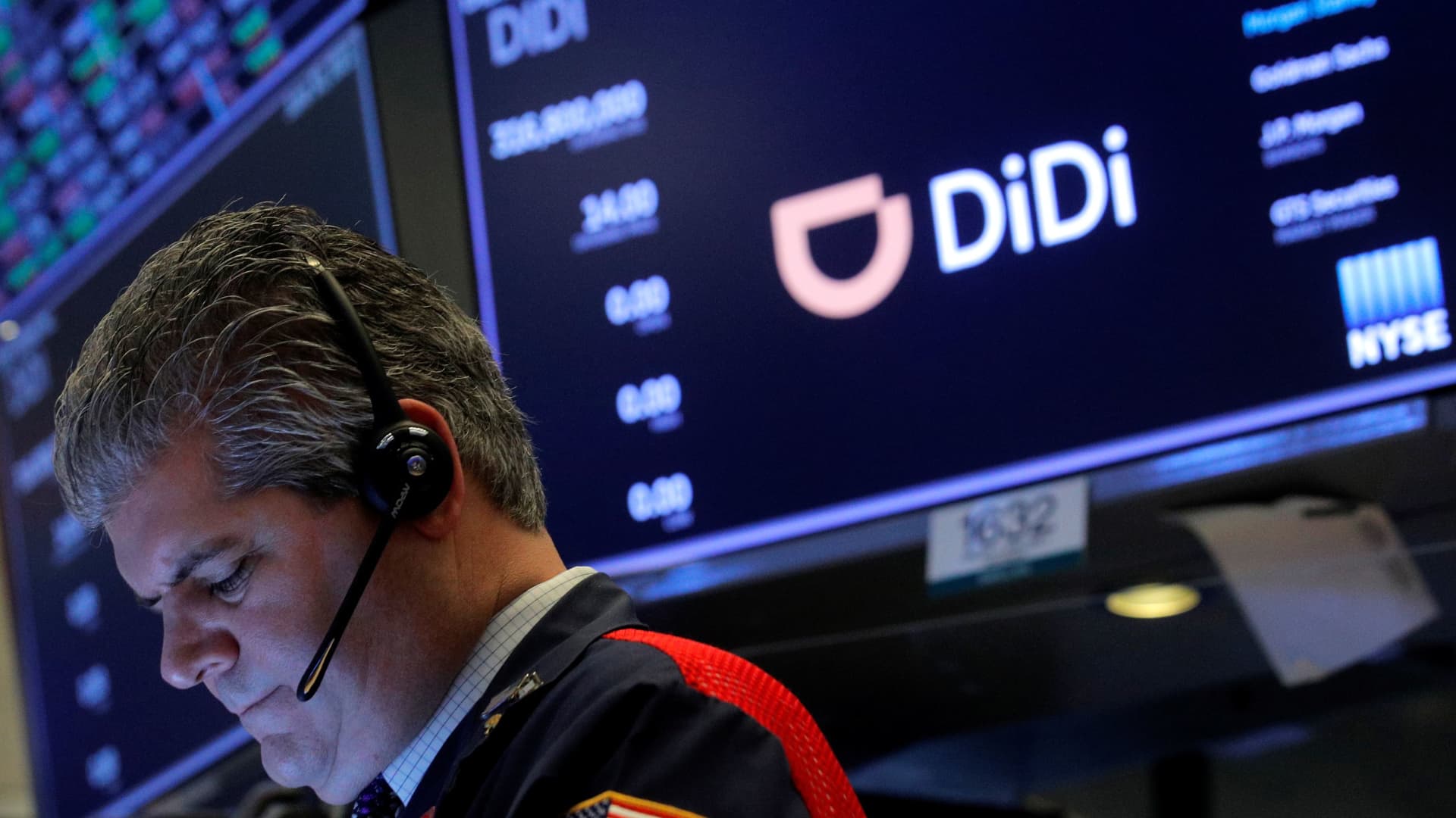 A trader works during the IPO for Chinese ride-hailing company Didi Global Inc on the New York Stock Exchange (NYSE) floor in New York City, U.S., June 30, 2021.
