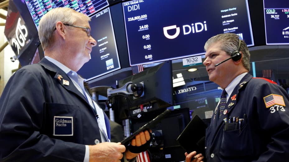 Traders work during the IPO for Chinese ride-hailing company Didi Global Inc on the New York Stock Exchange (NYSE) floor in New York City, U.S., June 30, 2021.